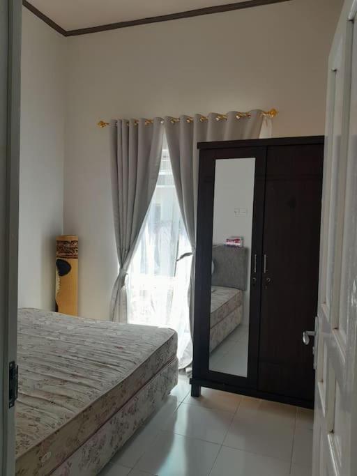 Three-Bedroom House photo 1