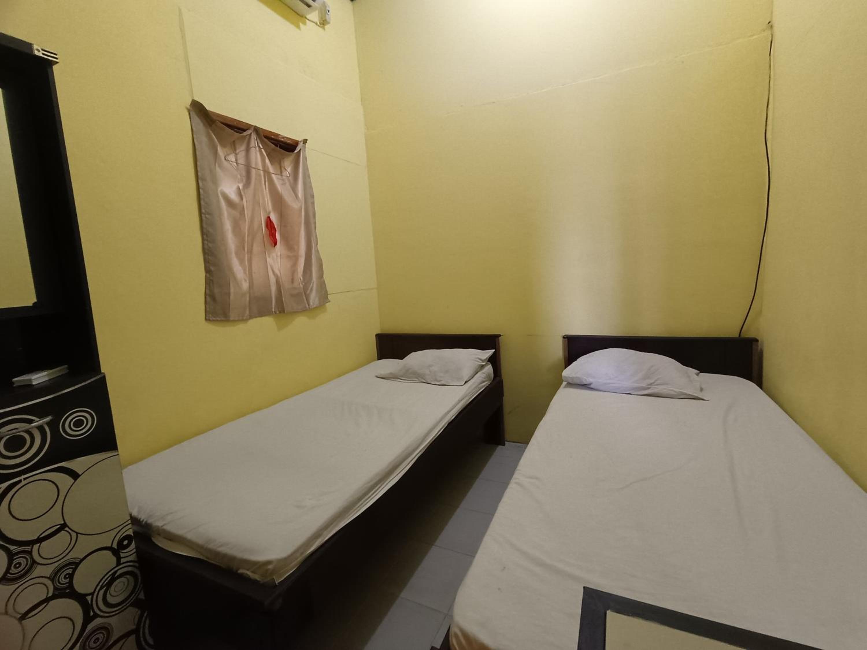 Standard Twin Room - Photo 4