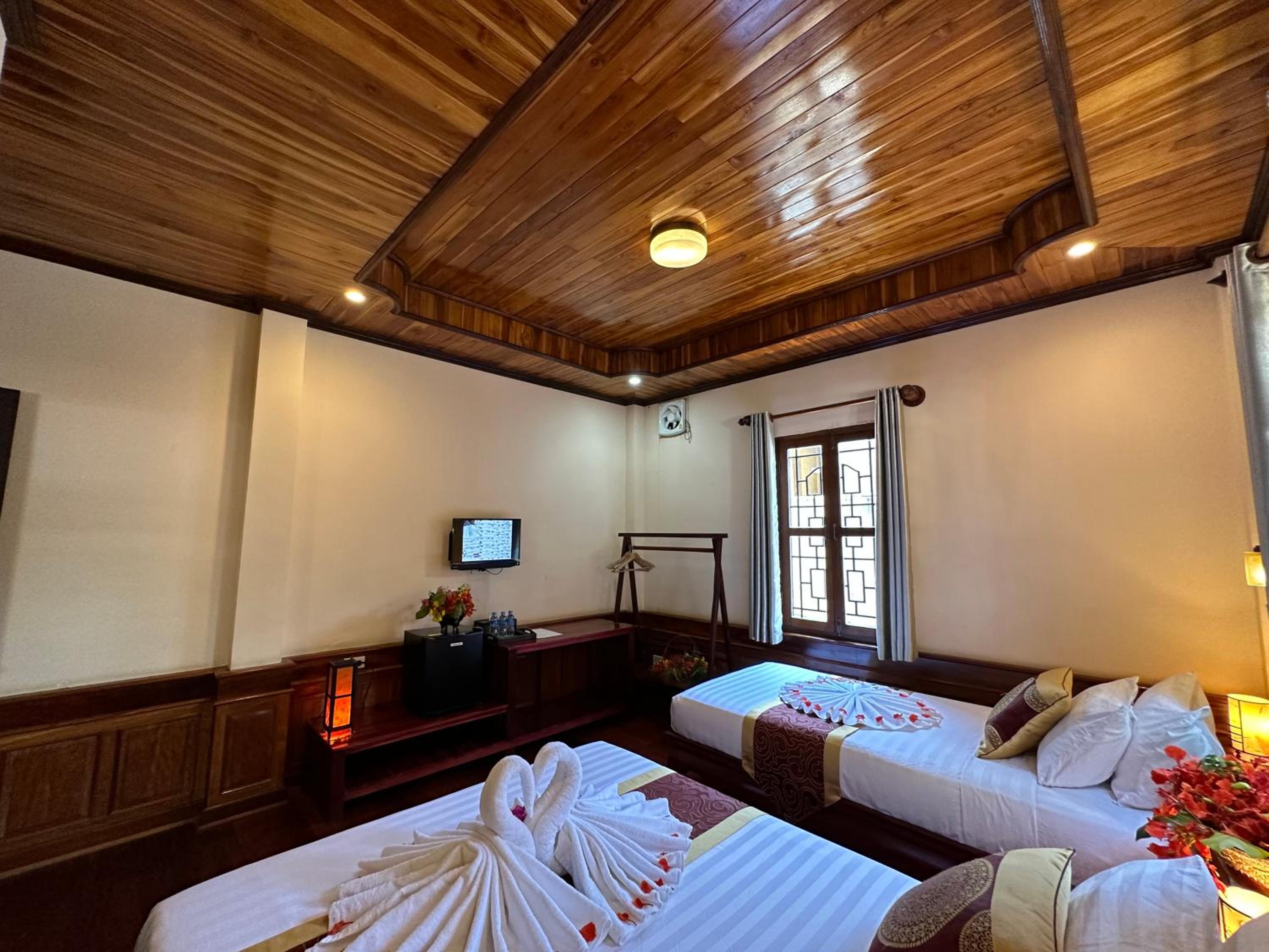 Deluxe Triple Room - Photo 29