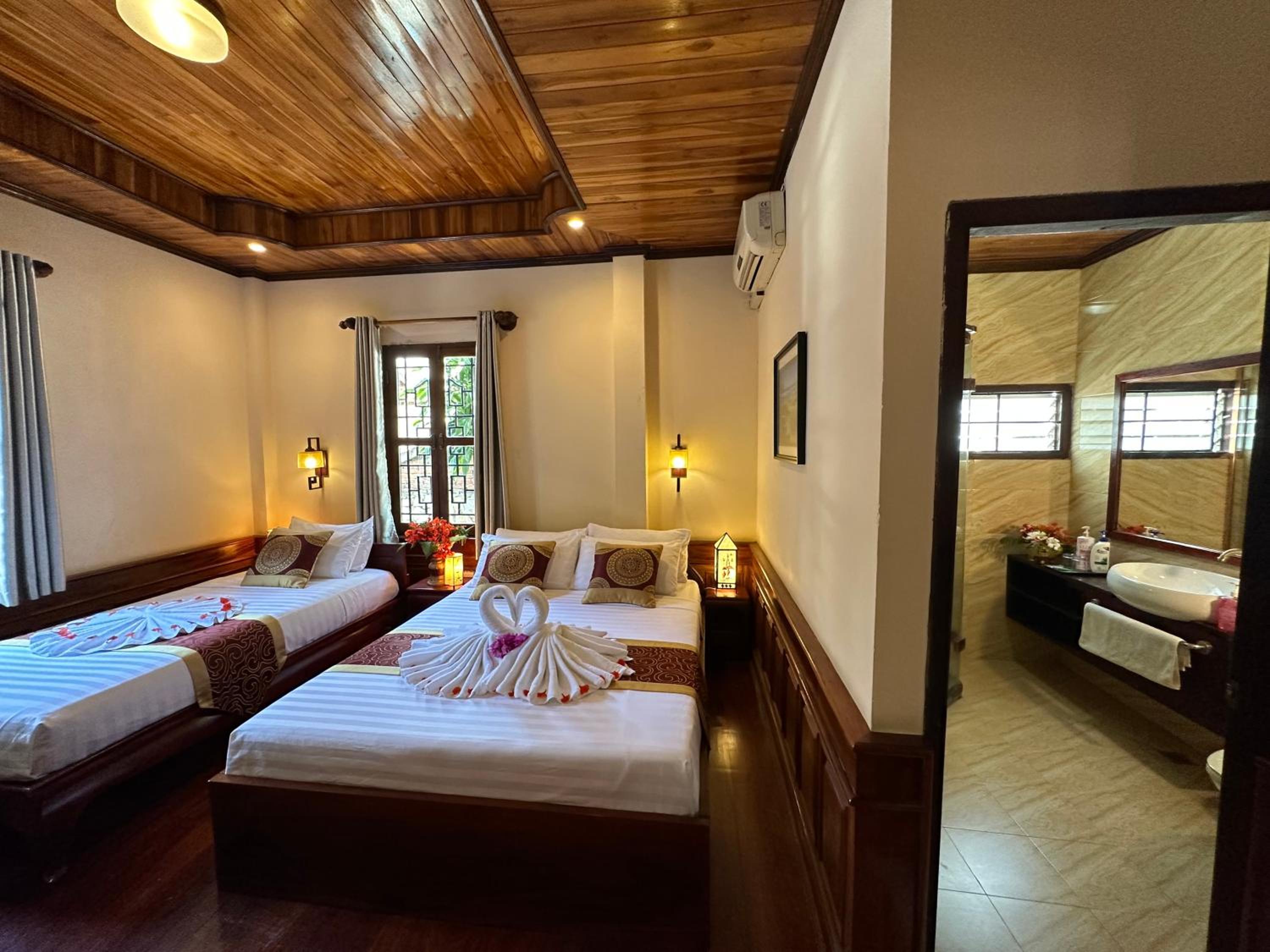 Deluxe Triple Room - Photo 40