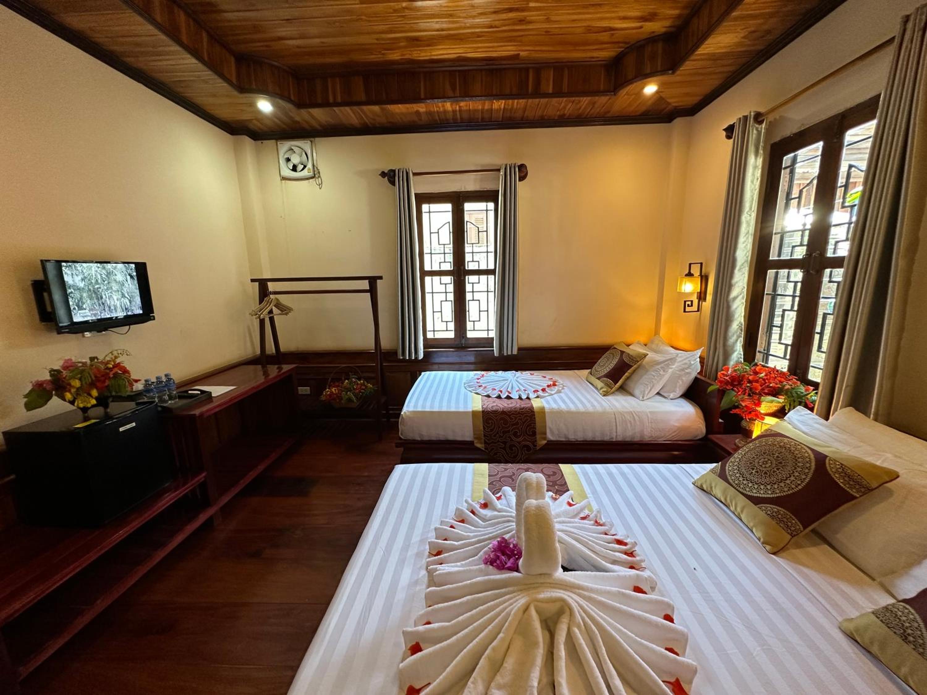 Deluxe Triple Room - Photo 23