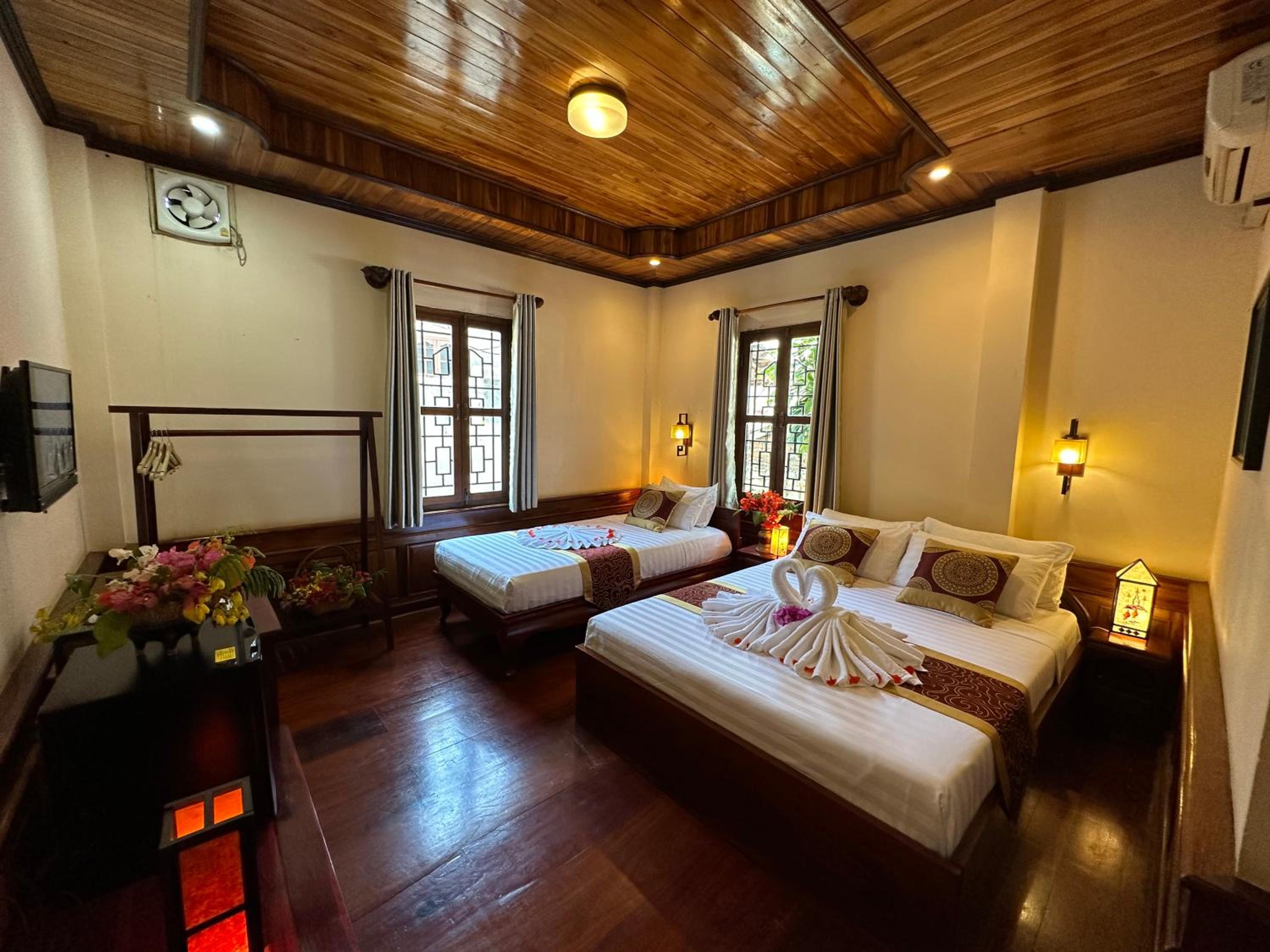 Deluxe Triple Room - Photo 32