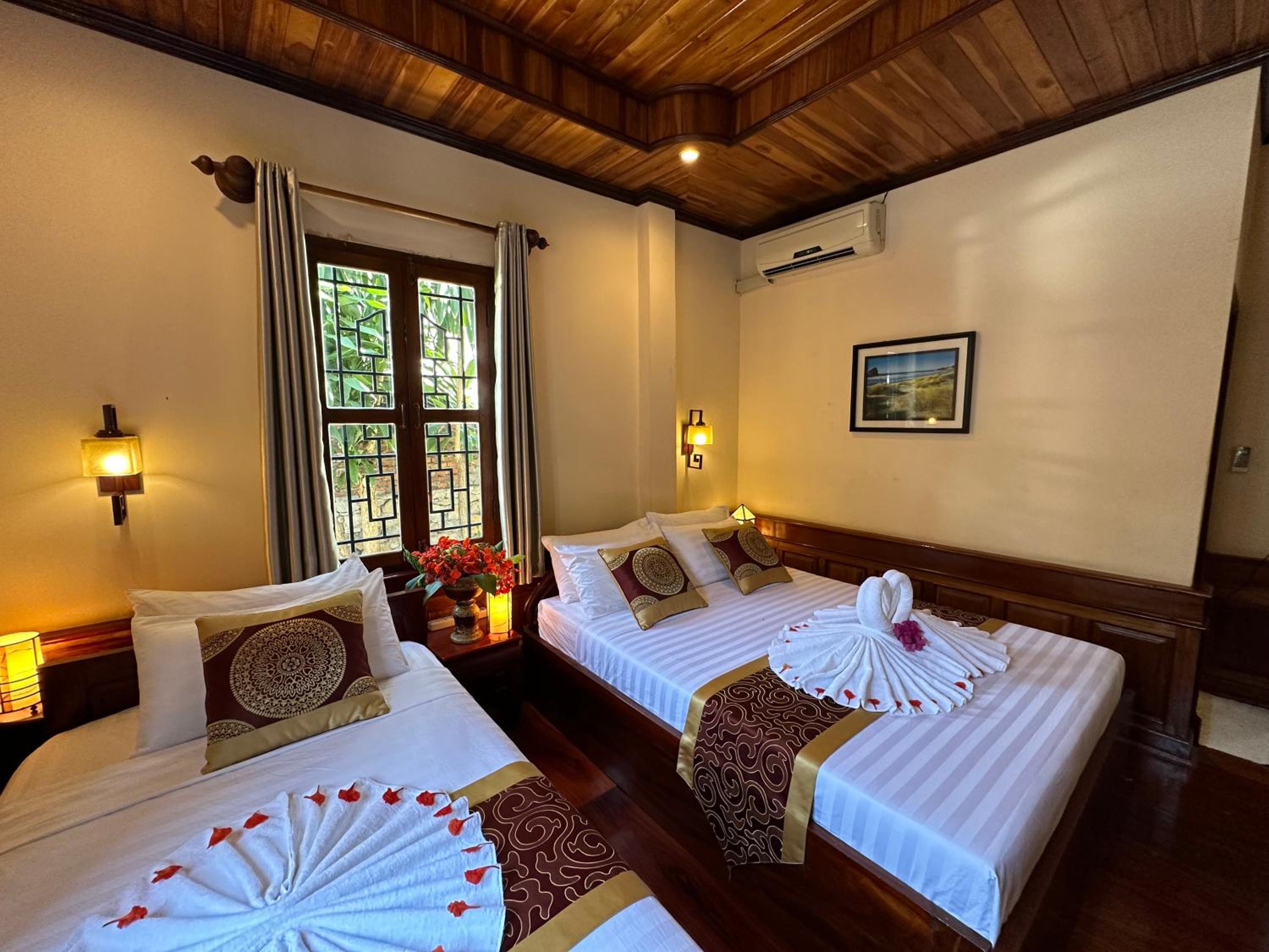 Deluxe Triple Room - Photo 35