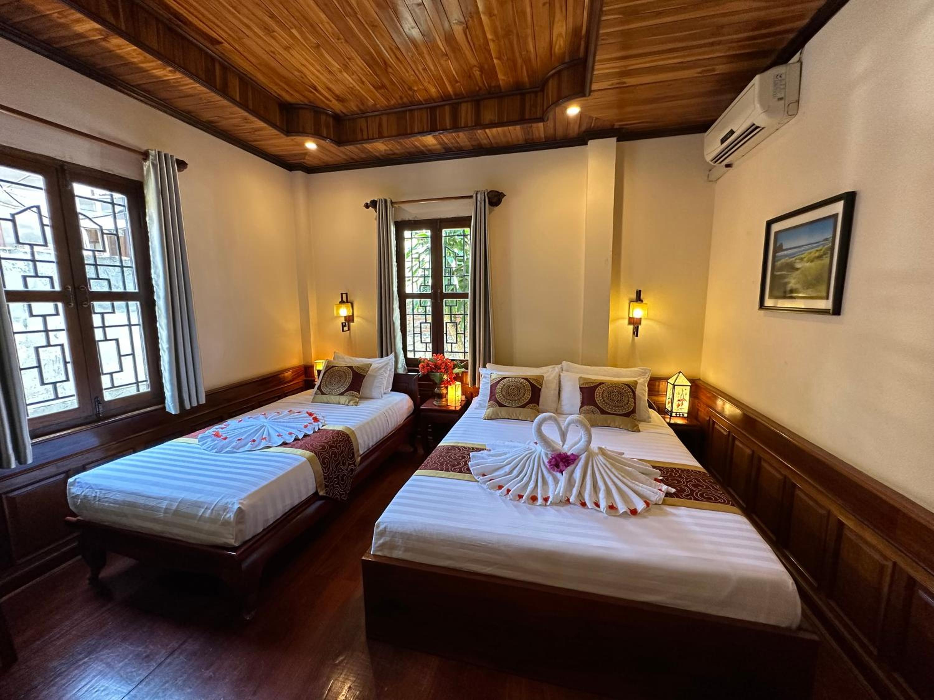 Deluxe Triple Room - Photo 36