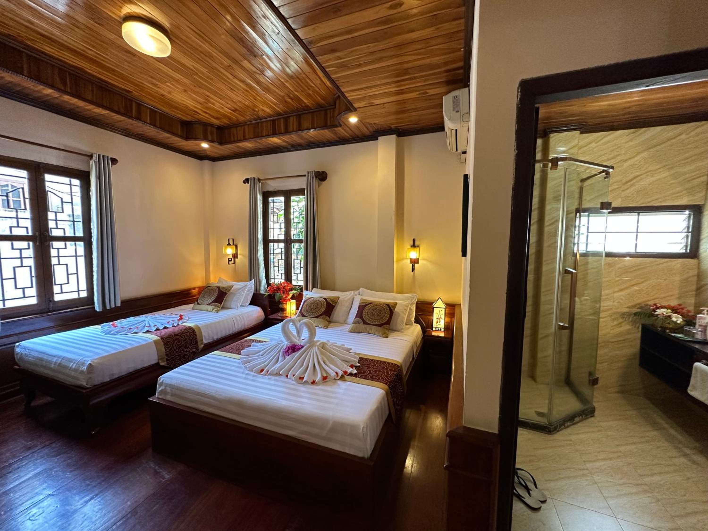 Deluxe Triple Room - Photo 1