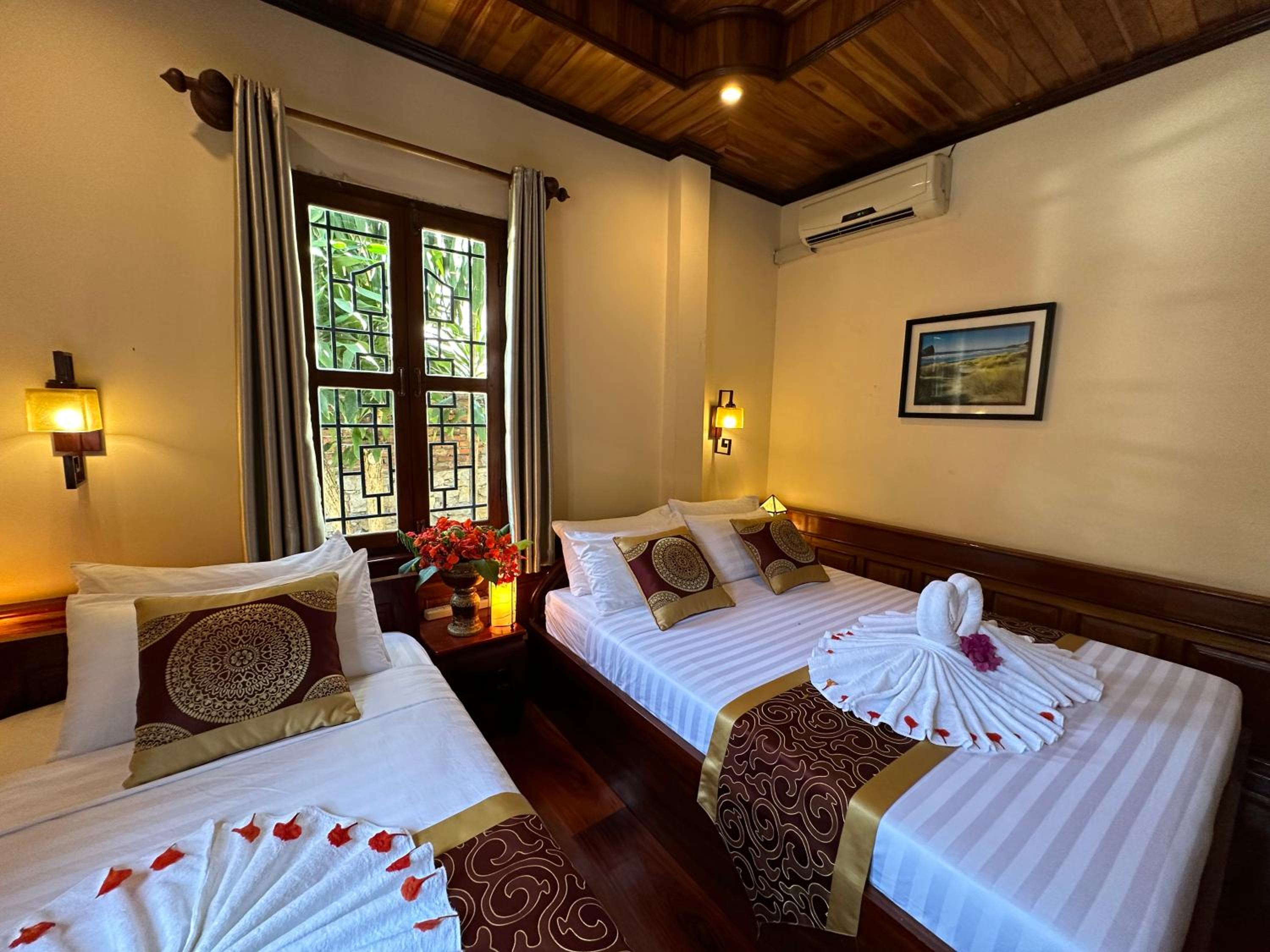 Deluxe Triple Room - Photo 24
