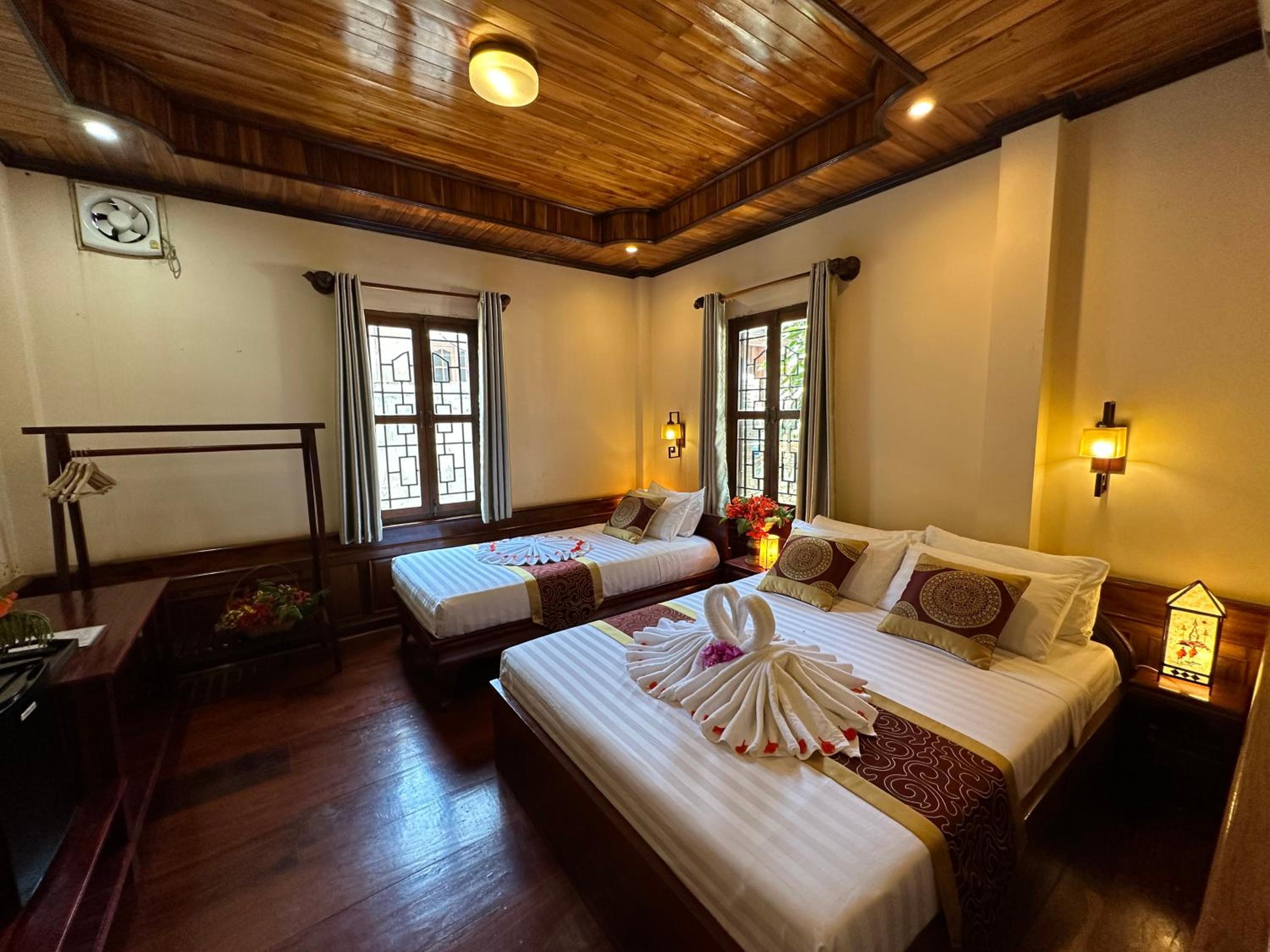 Deluxe Triple Room - Photo 26
