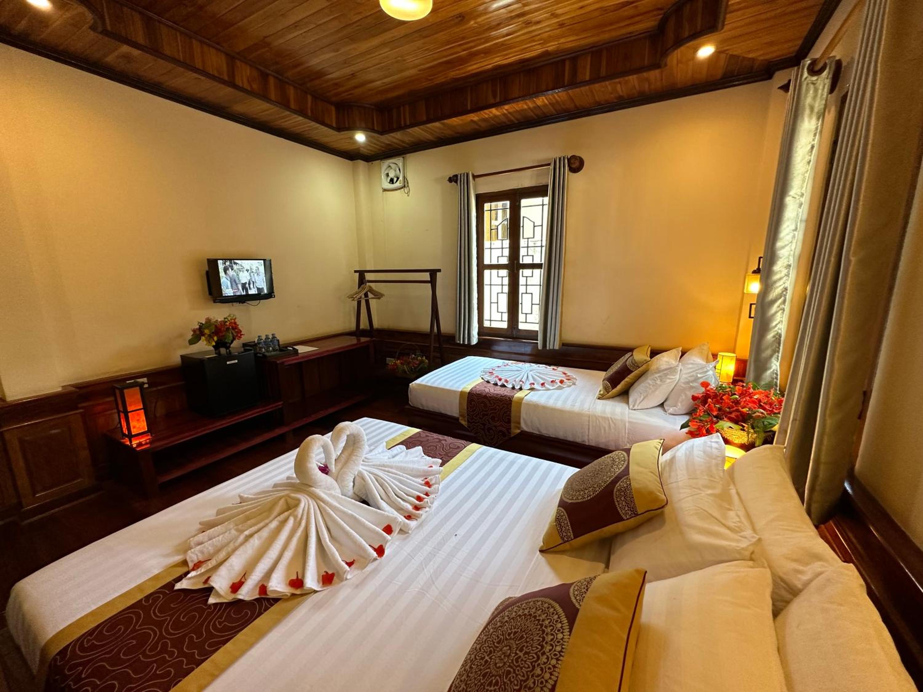 Deluxe Triple Room - Photo 27