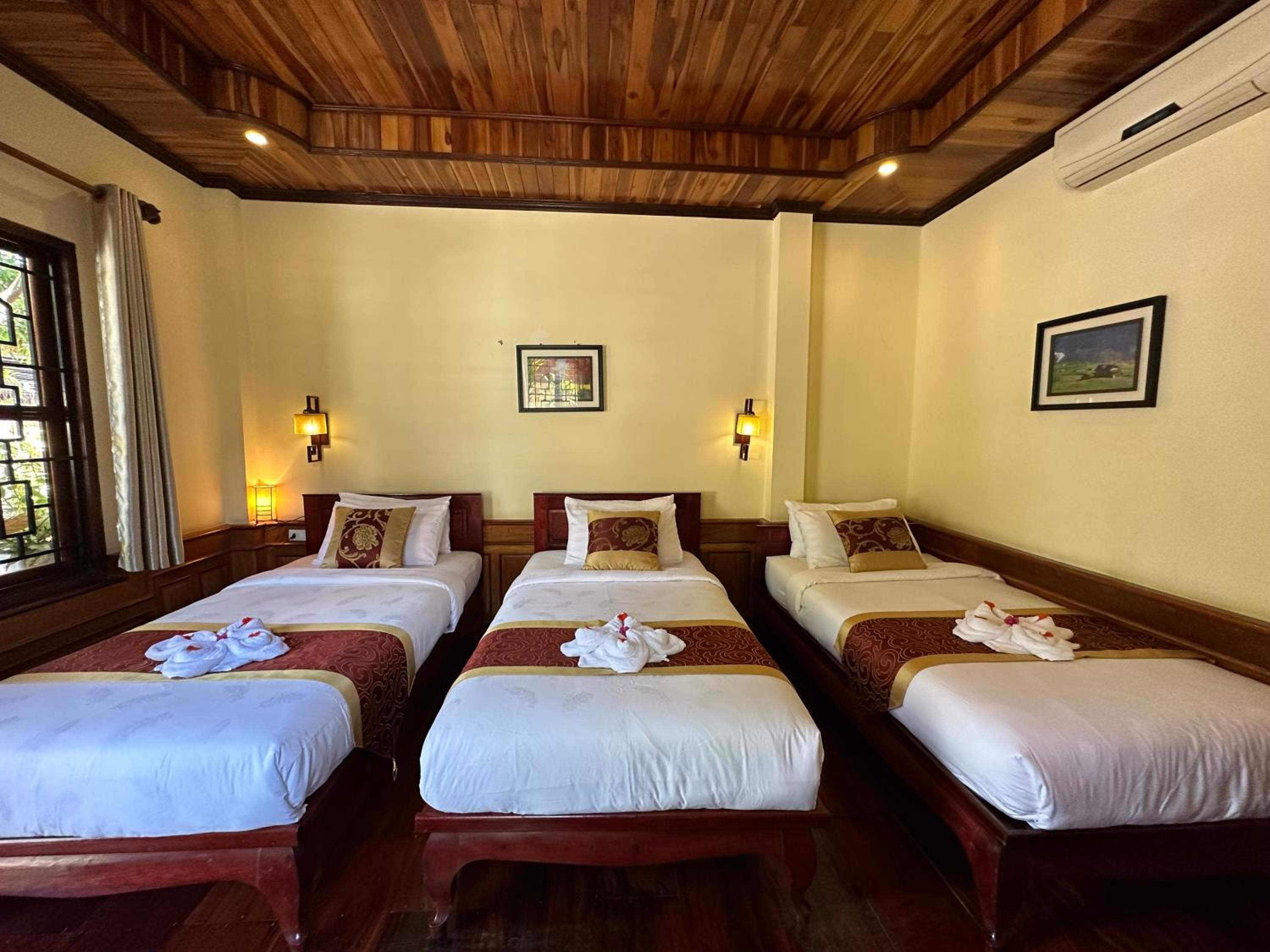 Deluxe Triple Room - Photo 2