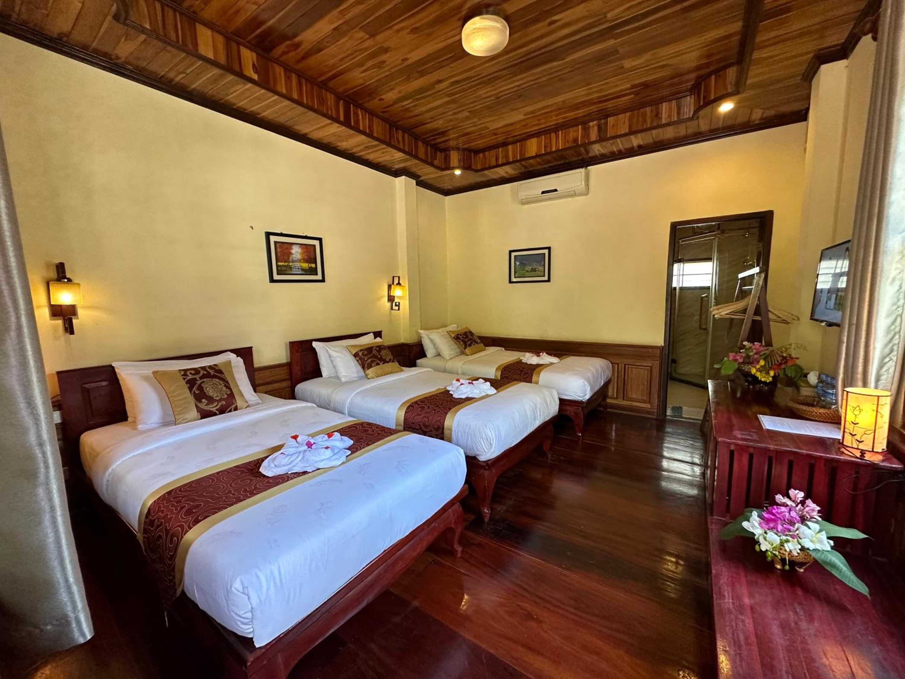 Deluxe Triple Room - Photo 18