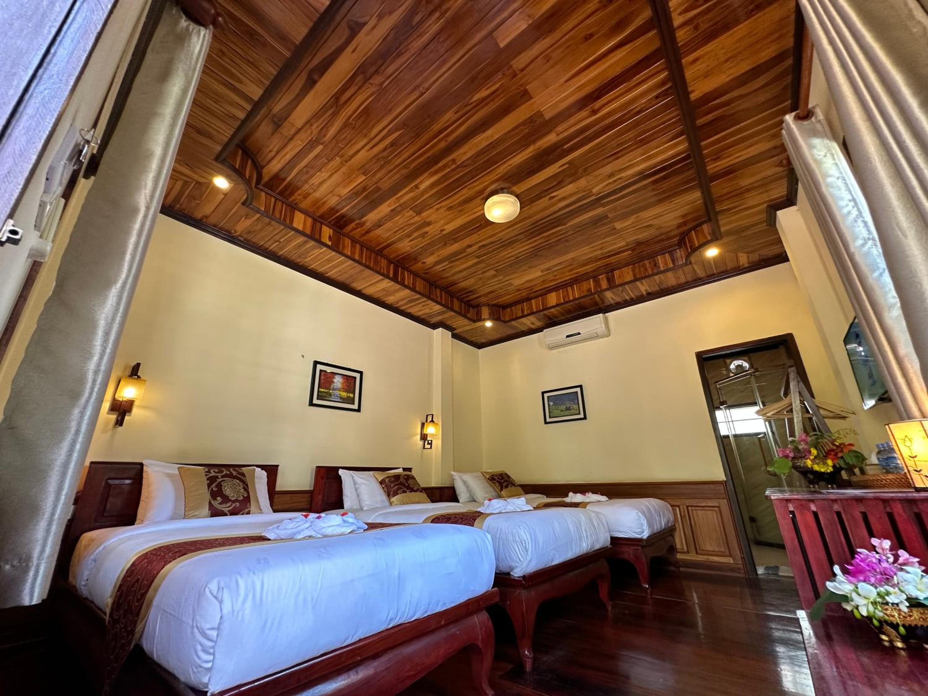 Deluxe Triple Room - Photo 20