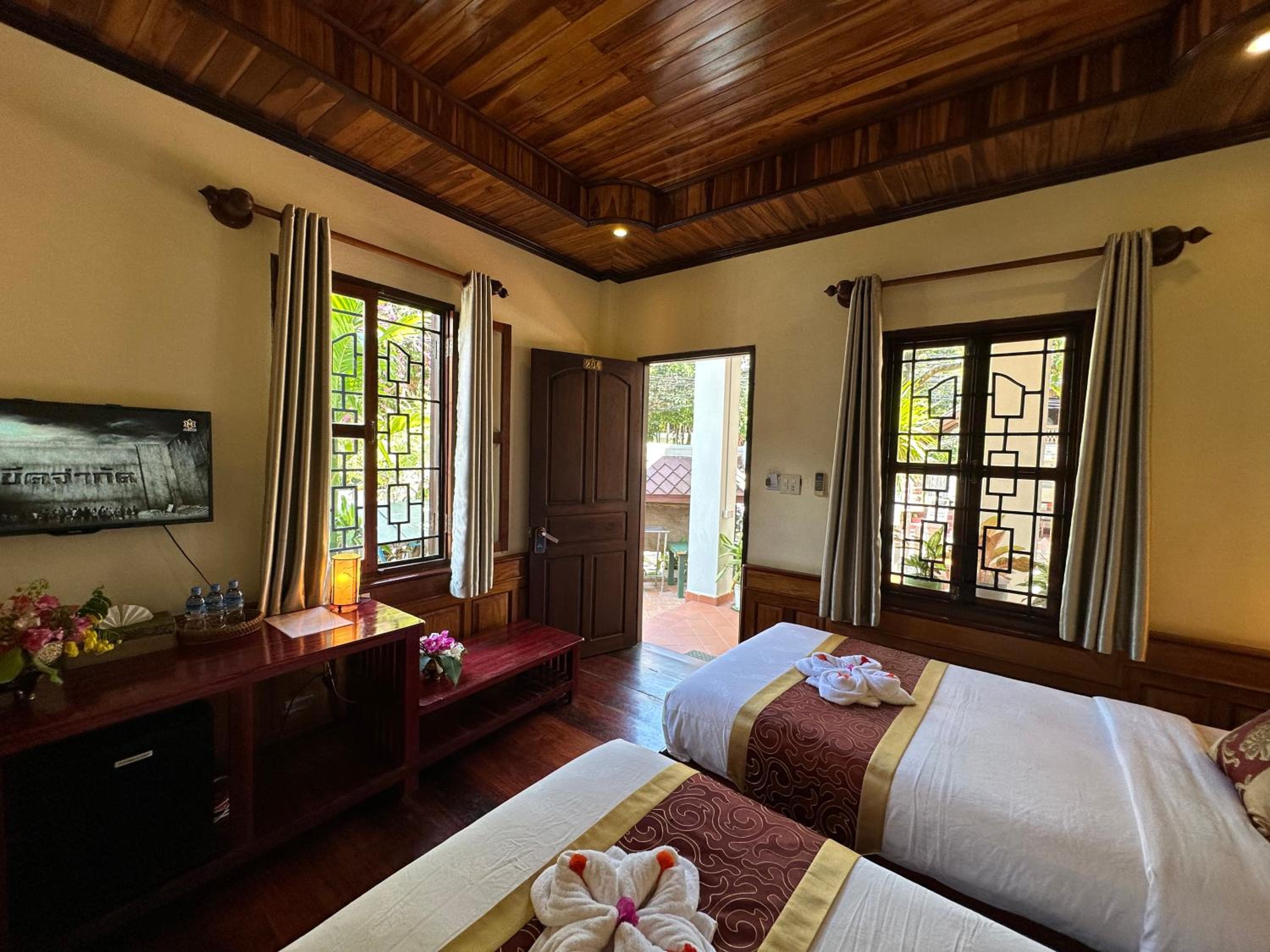 Deluxe Triple Room - Photo 16