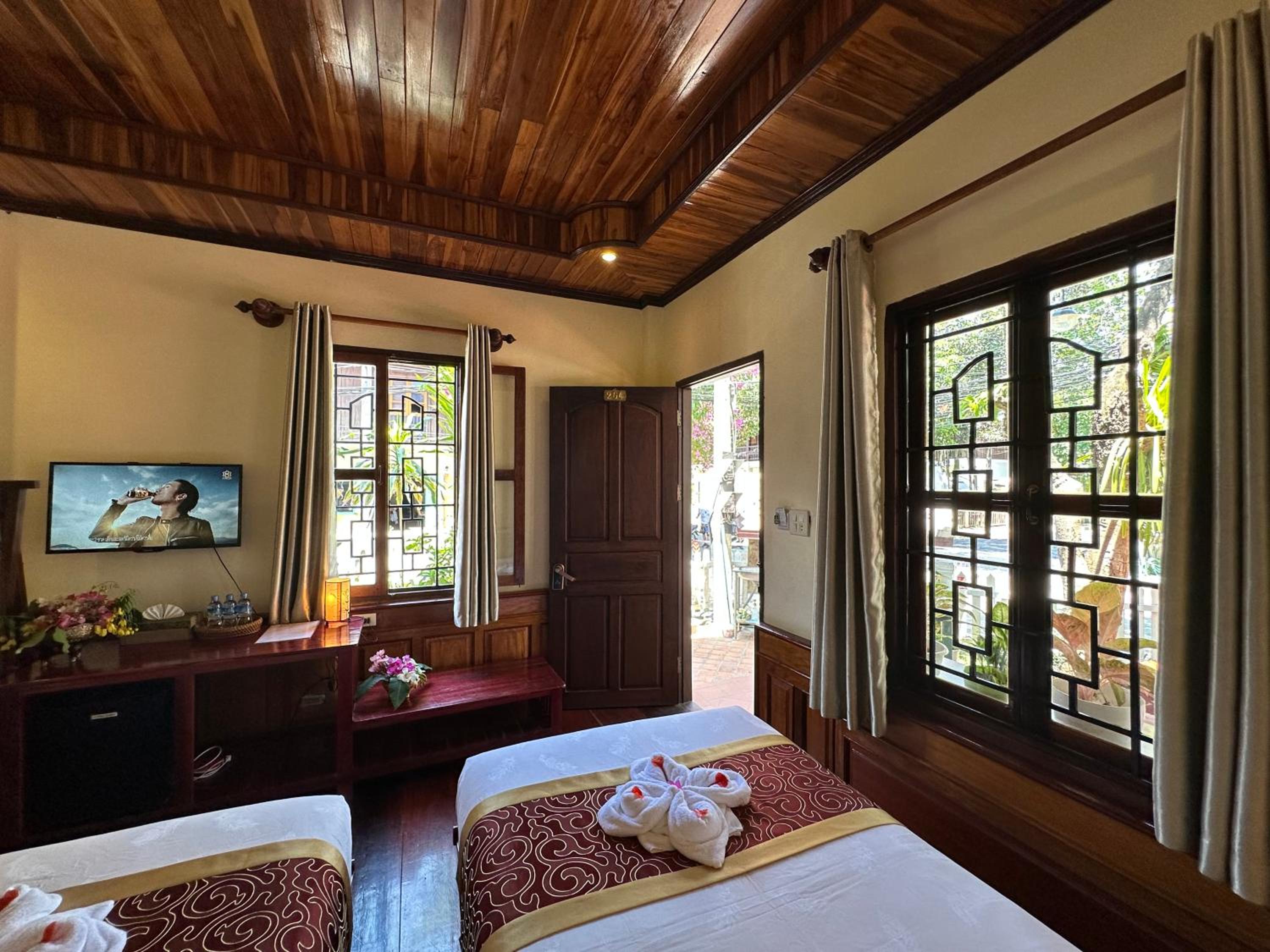 Deluxe Triple Room - Photo 17