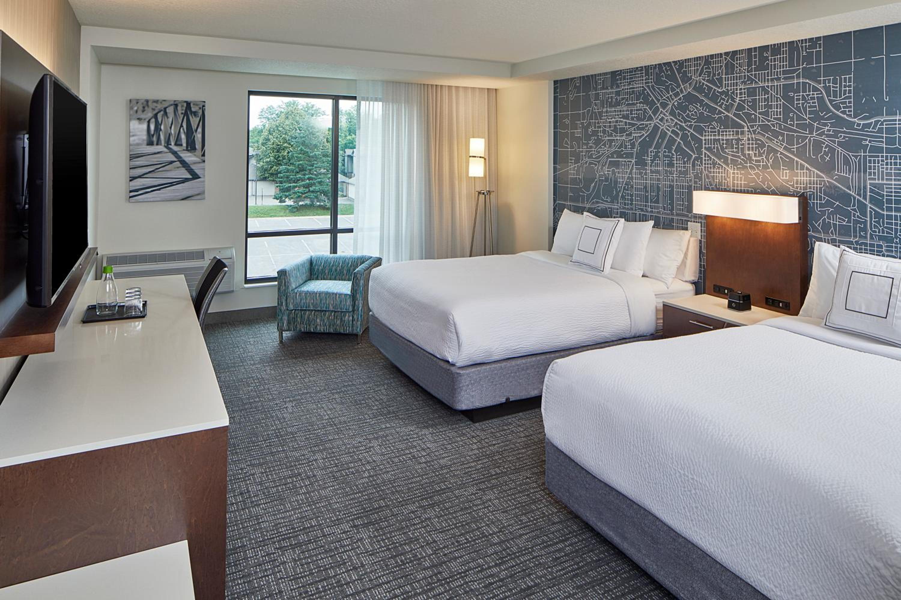Queen Room with Two Queen Beds - Hearing Accessible photo 1