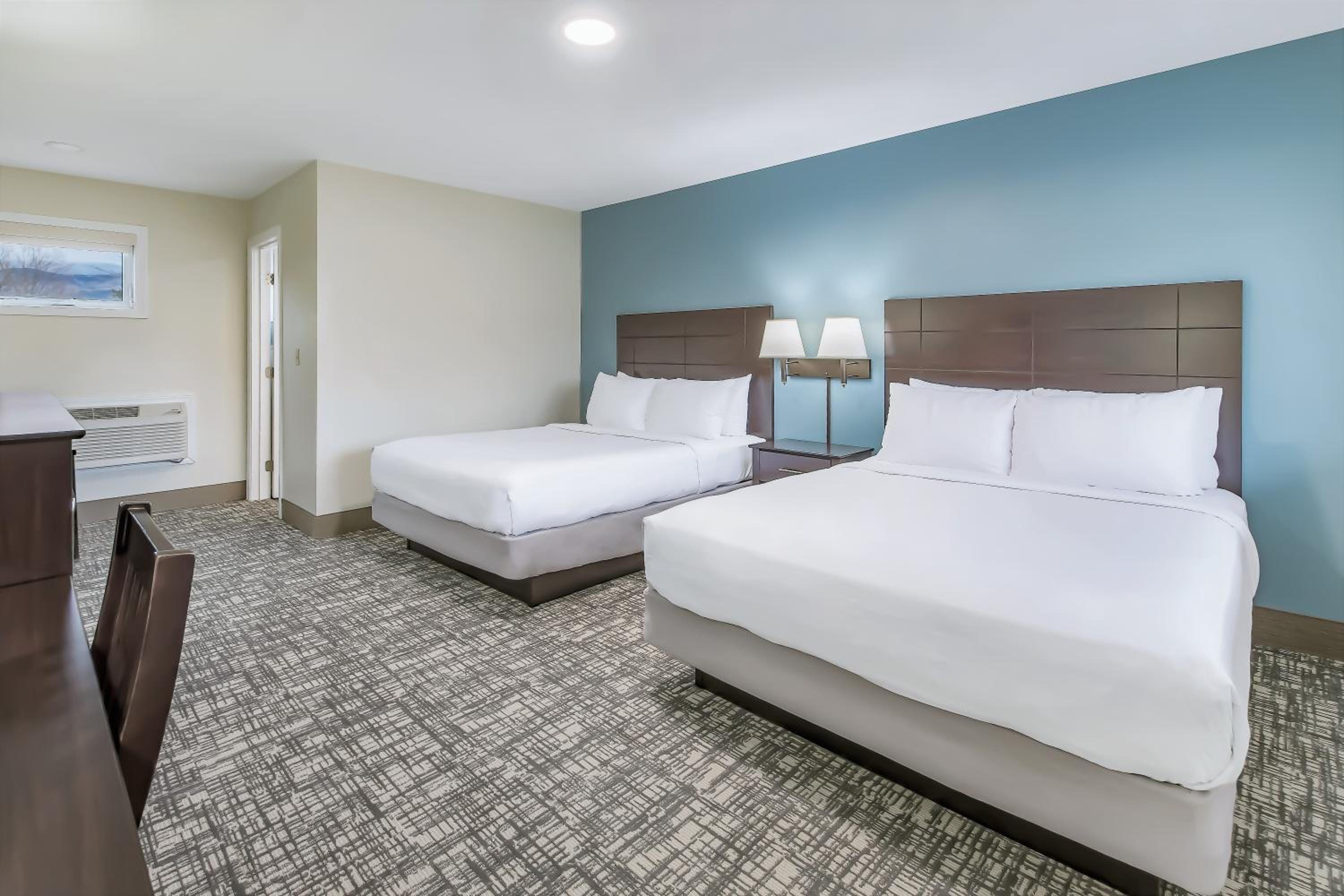 Deluxe Queen Room with Two Queen Beds - Photo 1