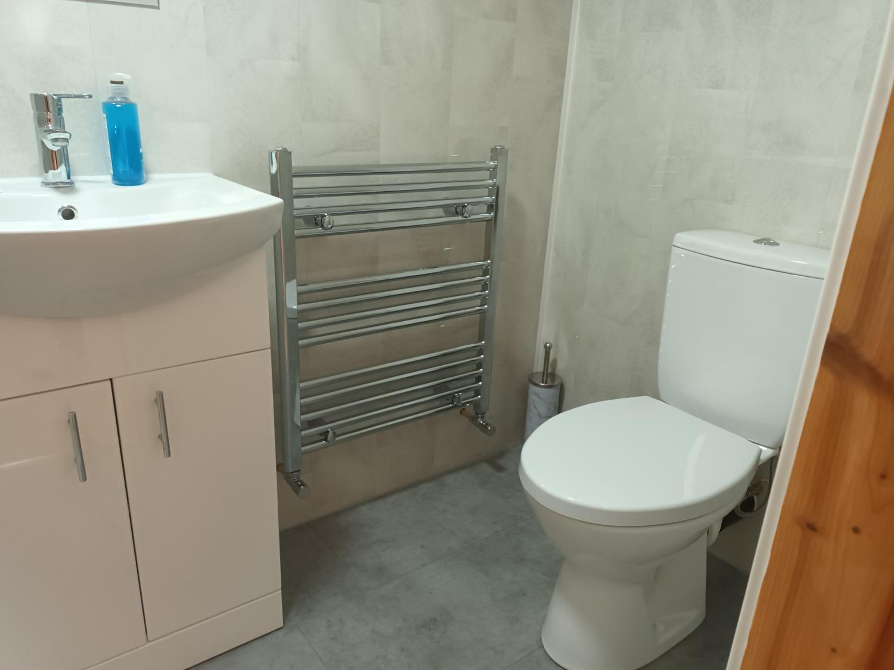 Three-Bedroom House - Photo 27