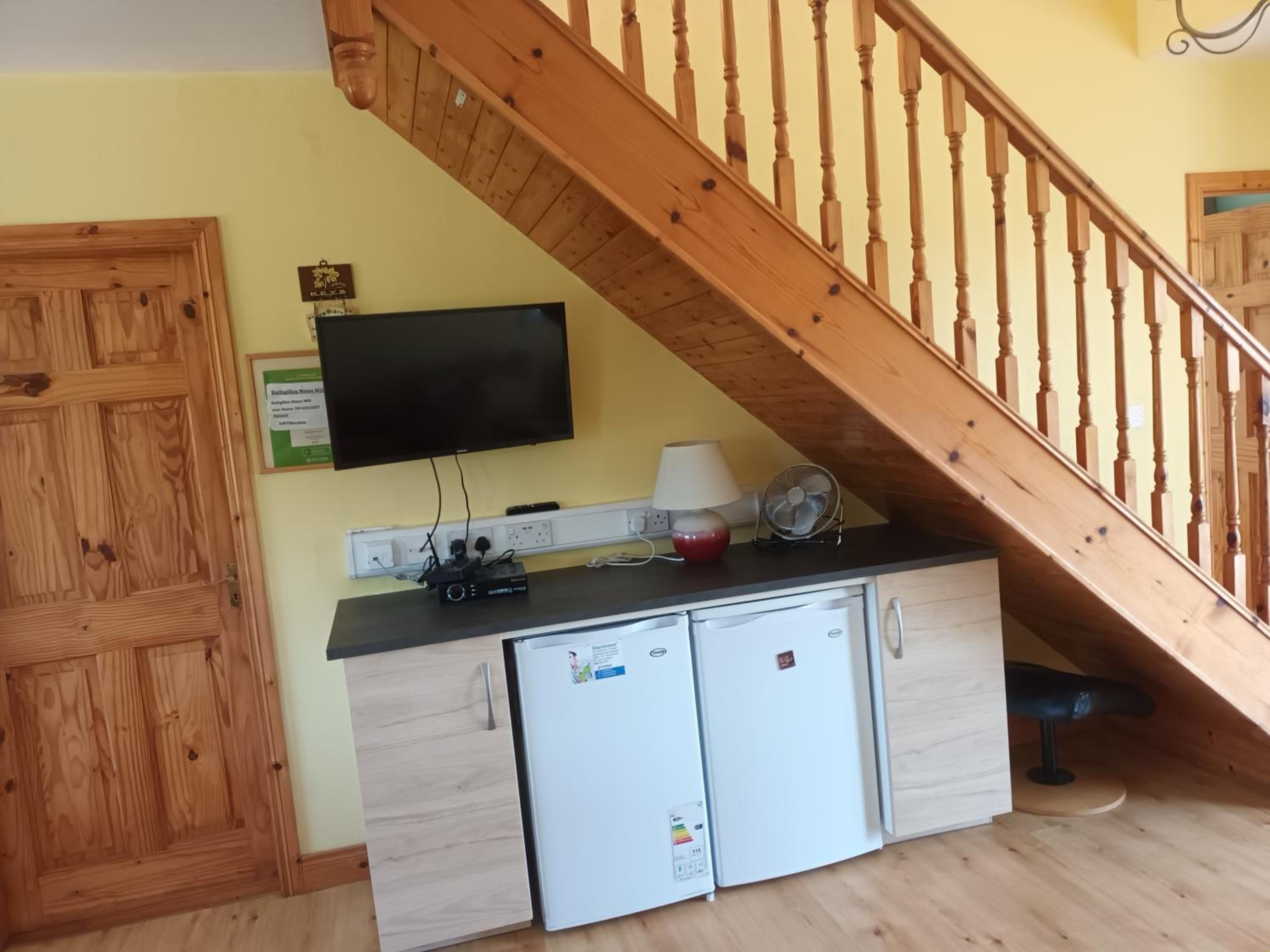 Three-Bedroom House - Photo 25