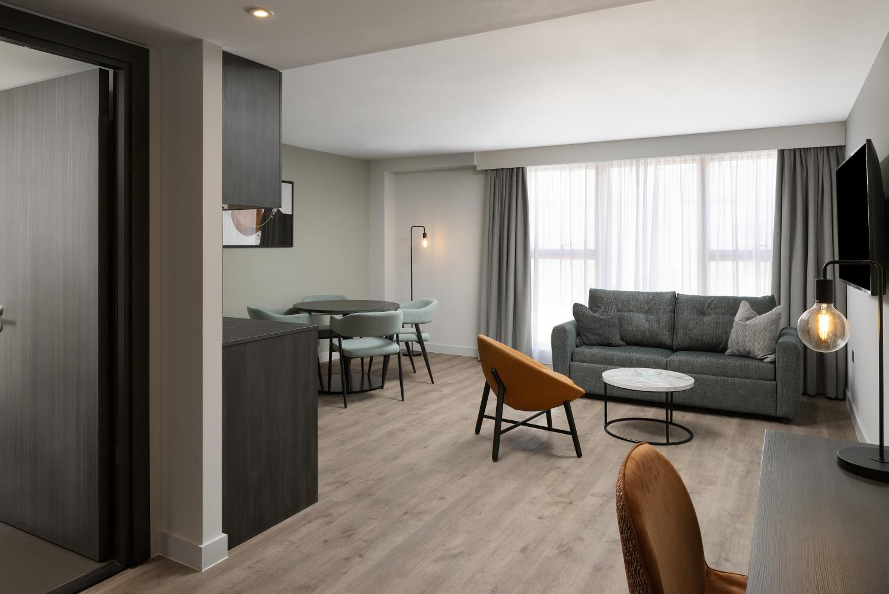 One-Bedroom Queen Suite with Sofa Bed - Photo 1