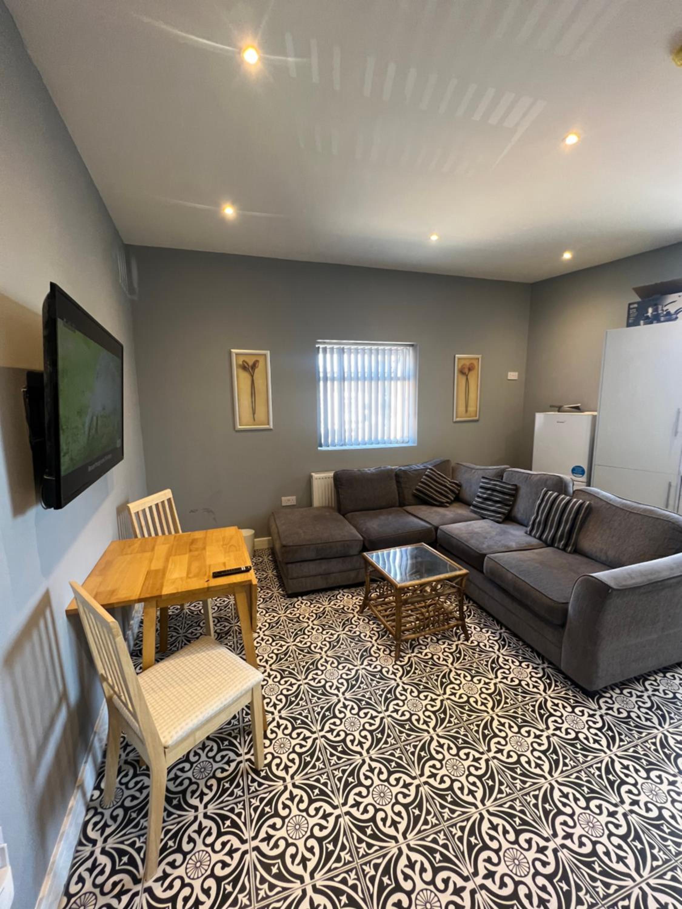 Three-Bedroom Apartment photo 1