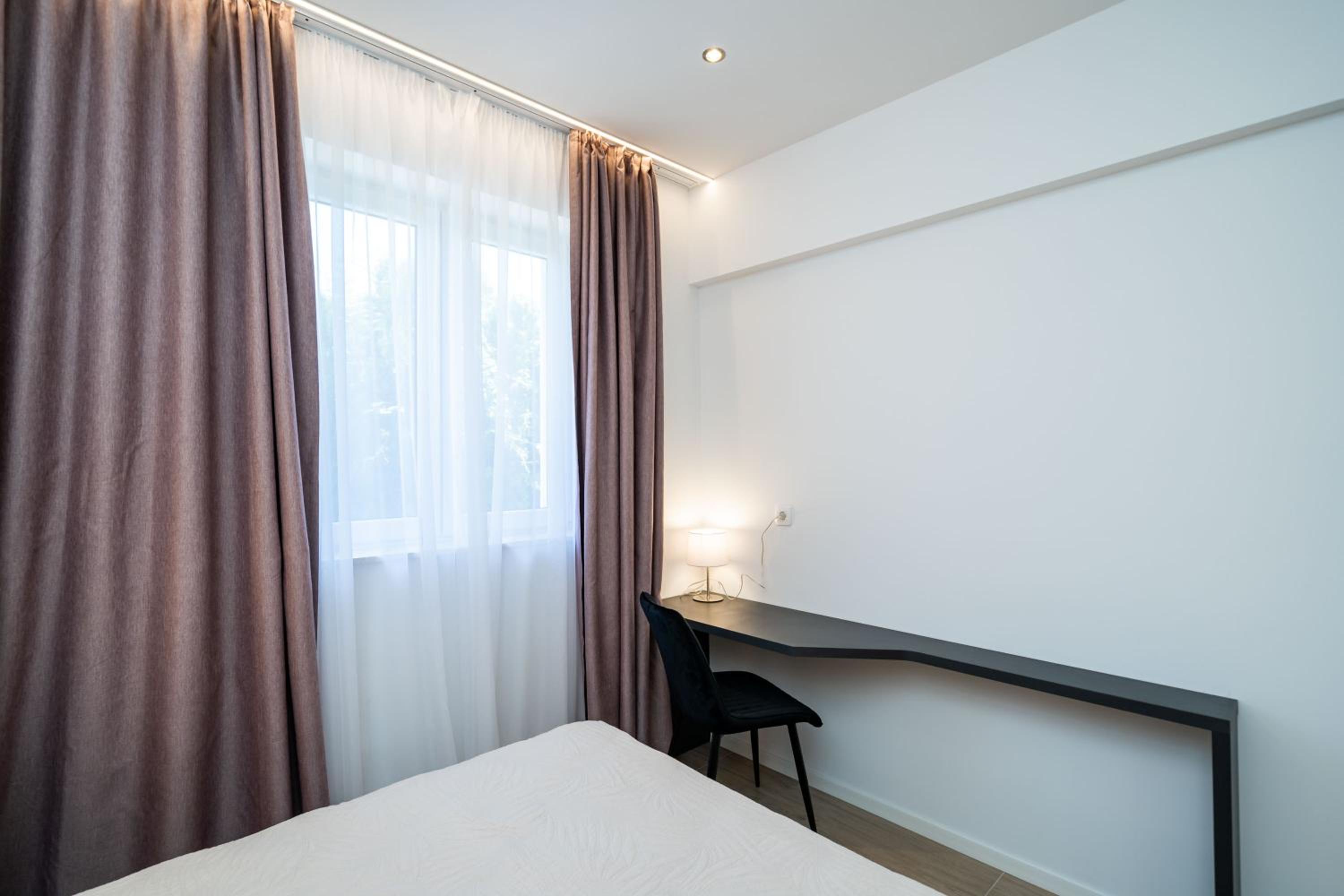 One-Bedroom Apartment with Patio - Ground Floor - Photo 2