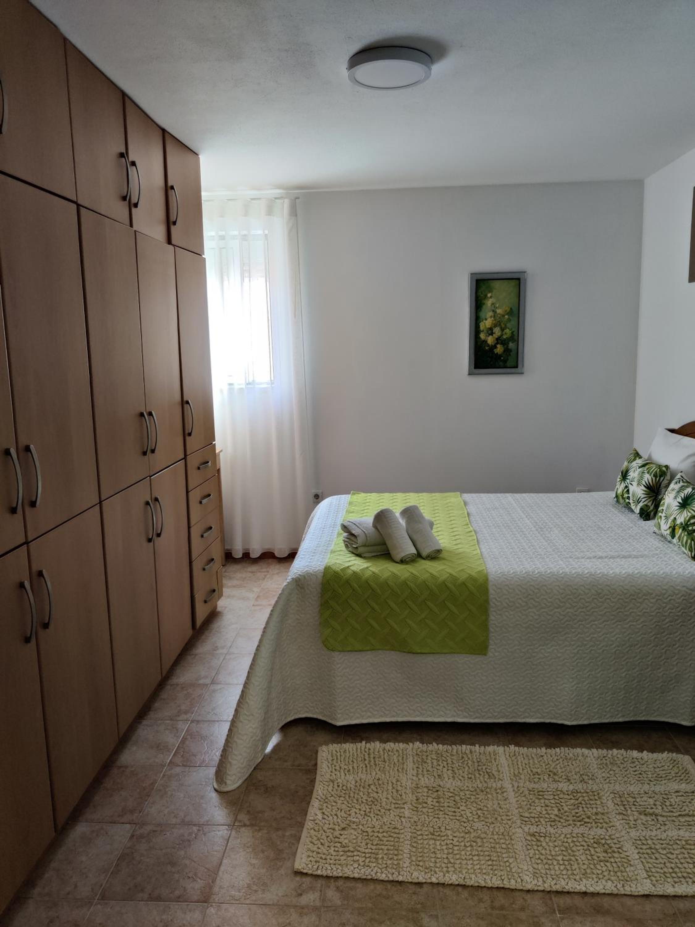 Three-Bedroom House - Photo 23