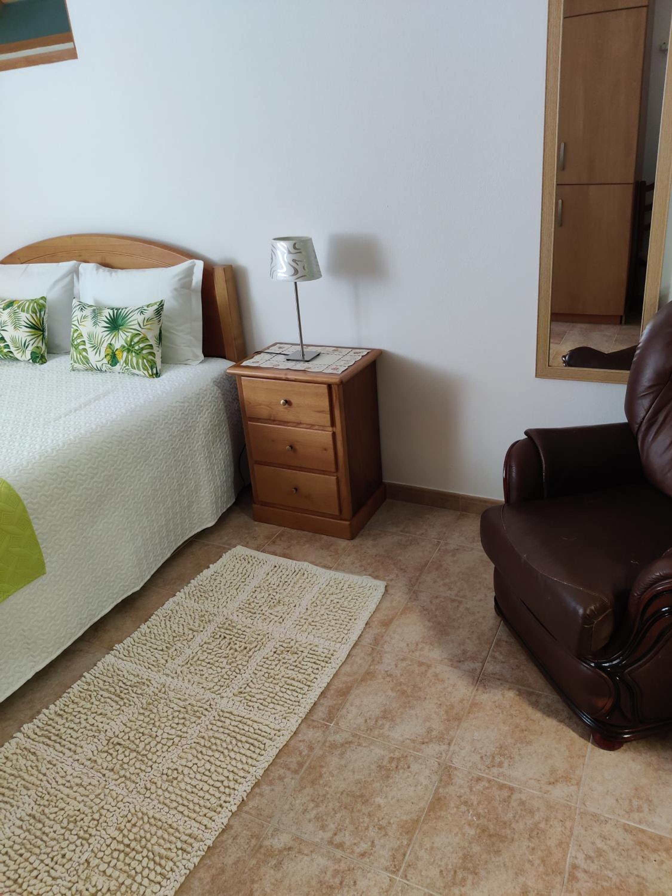 Three-Bedroom House - Photo 24