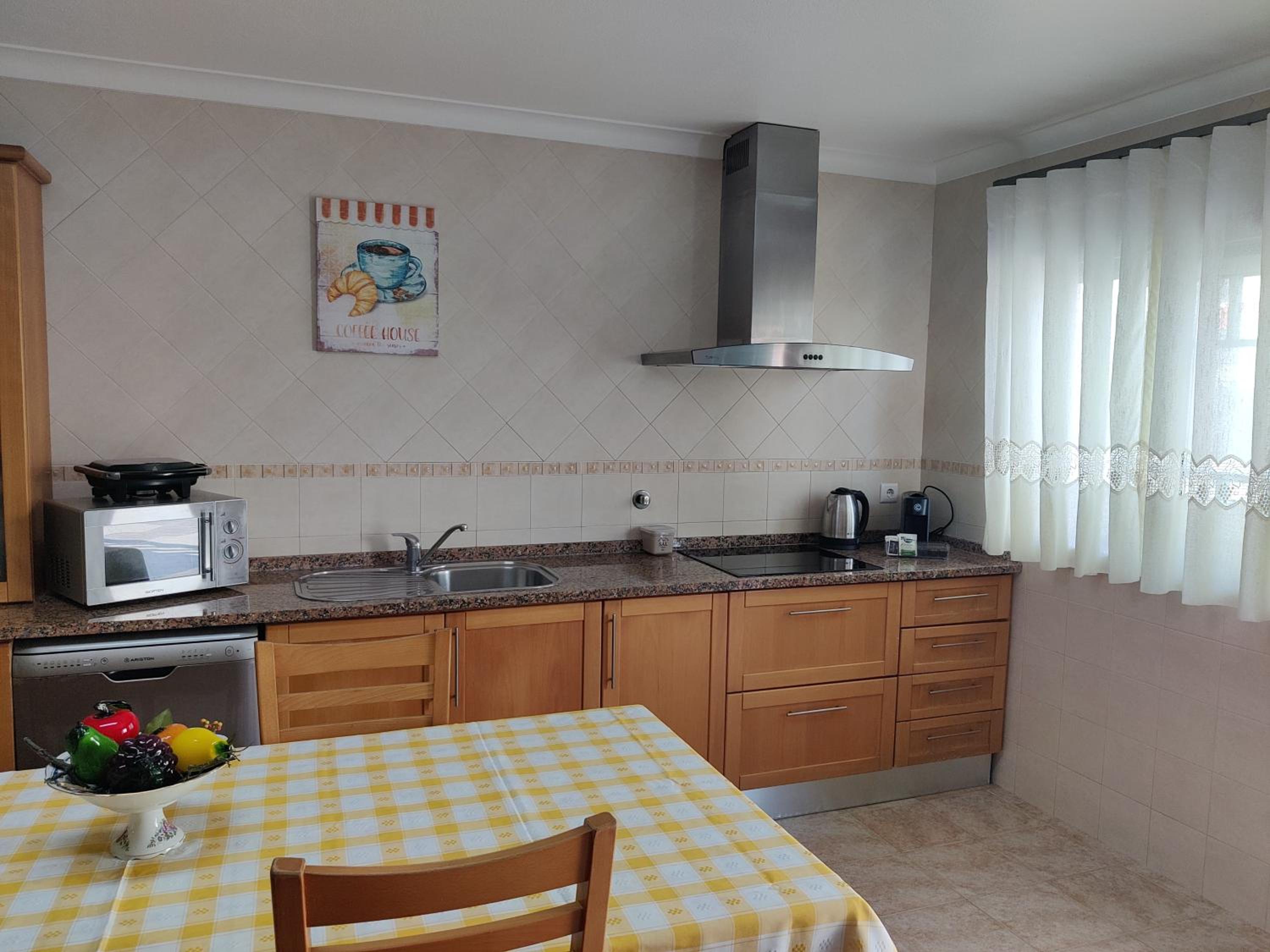 Three-Bedroom House - Photo 28