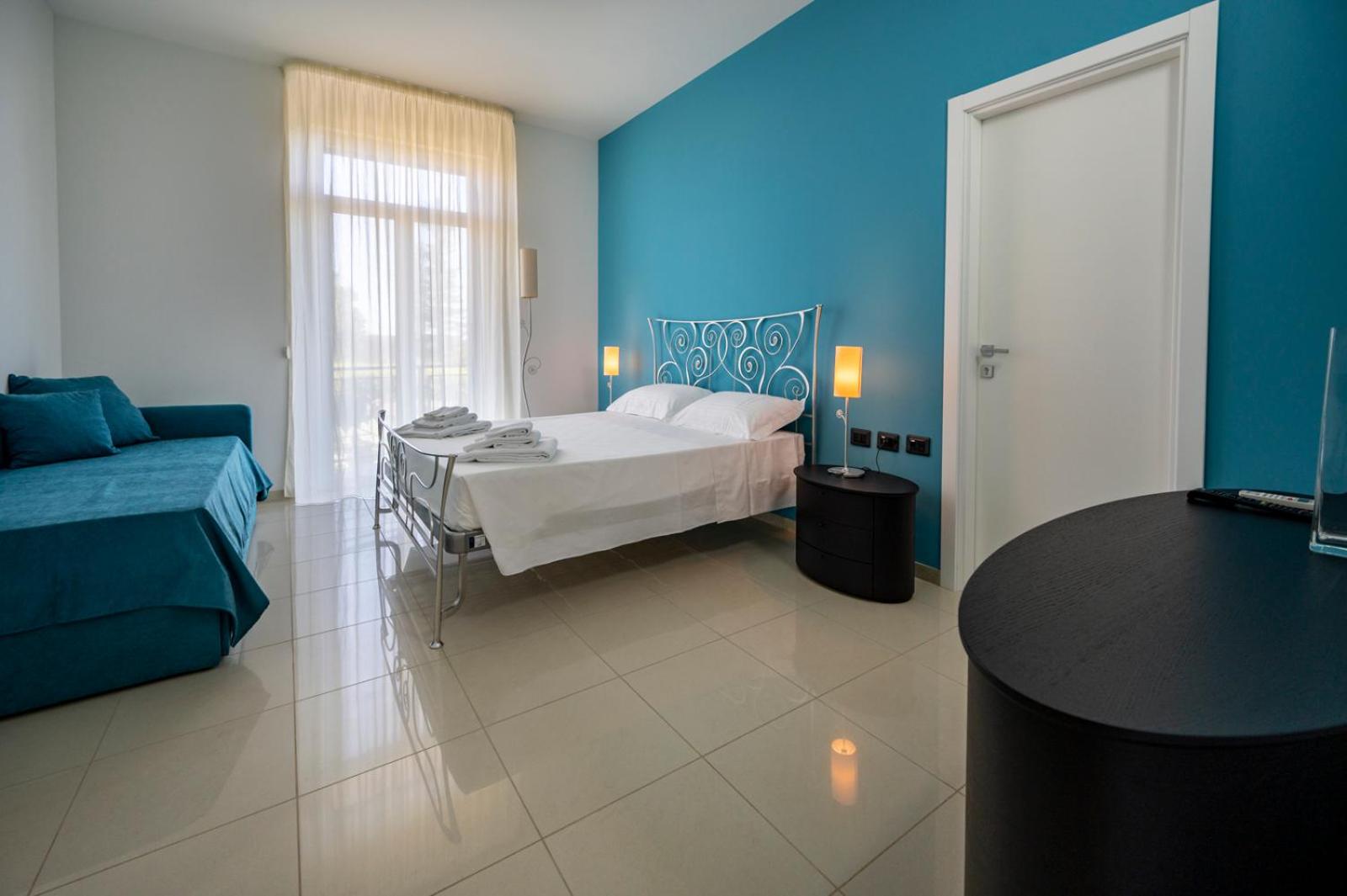 Double Room with Balcony (2 Adults + 1 Child) photo 1