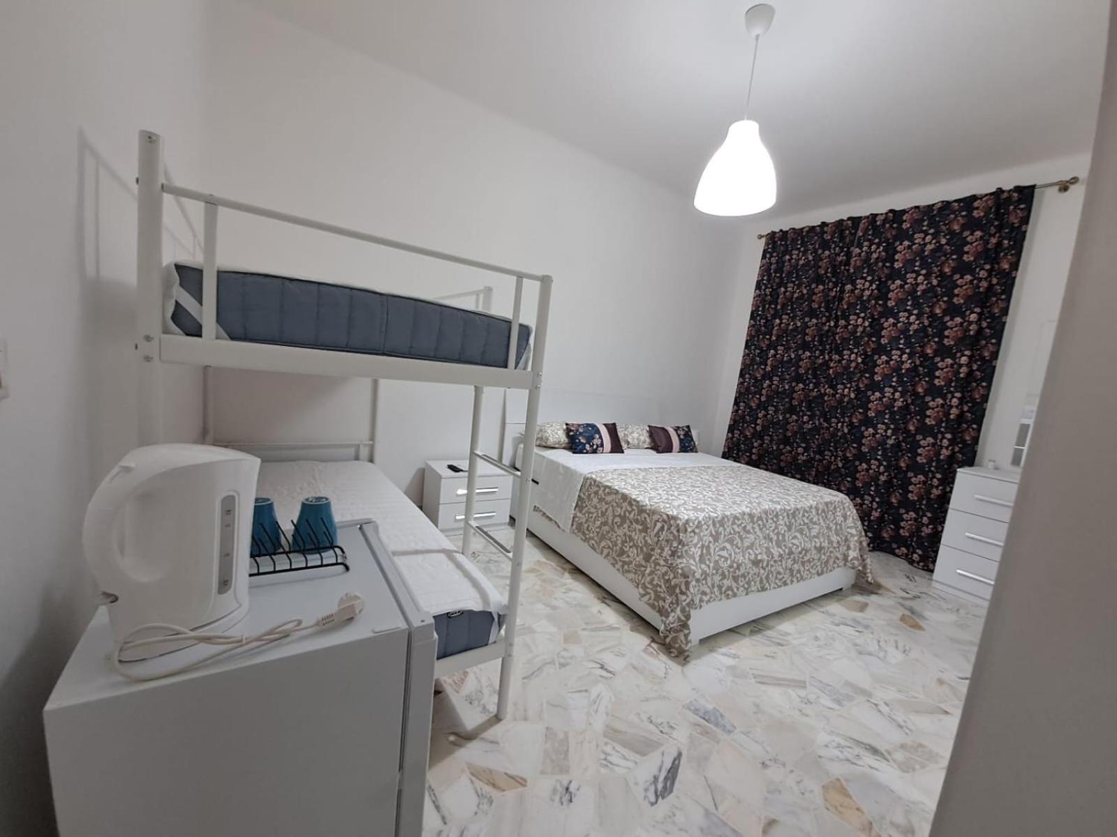 Quadruple Room with Shared Bathroom
