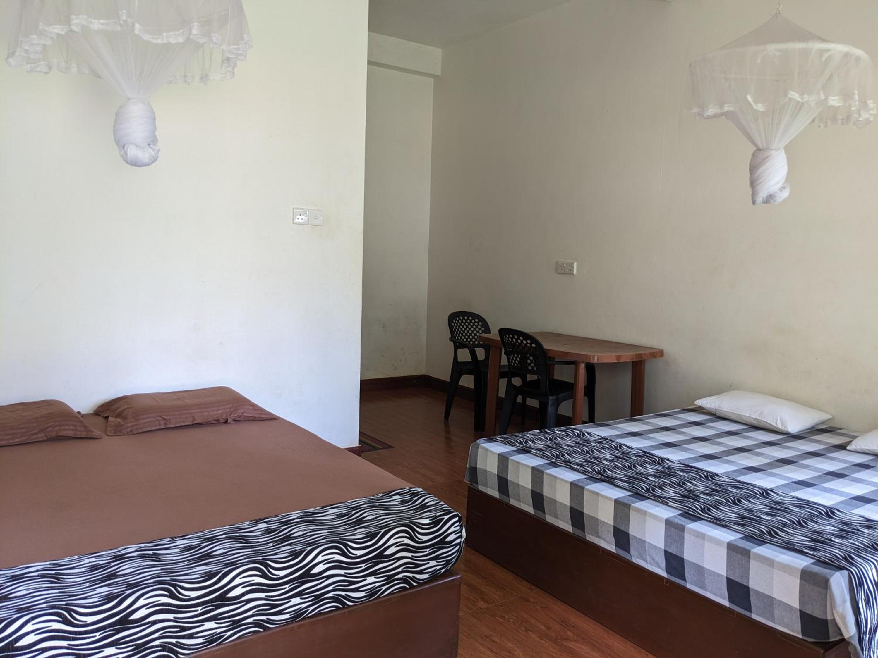 Quadruple Room with Private Bathroom