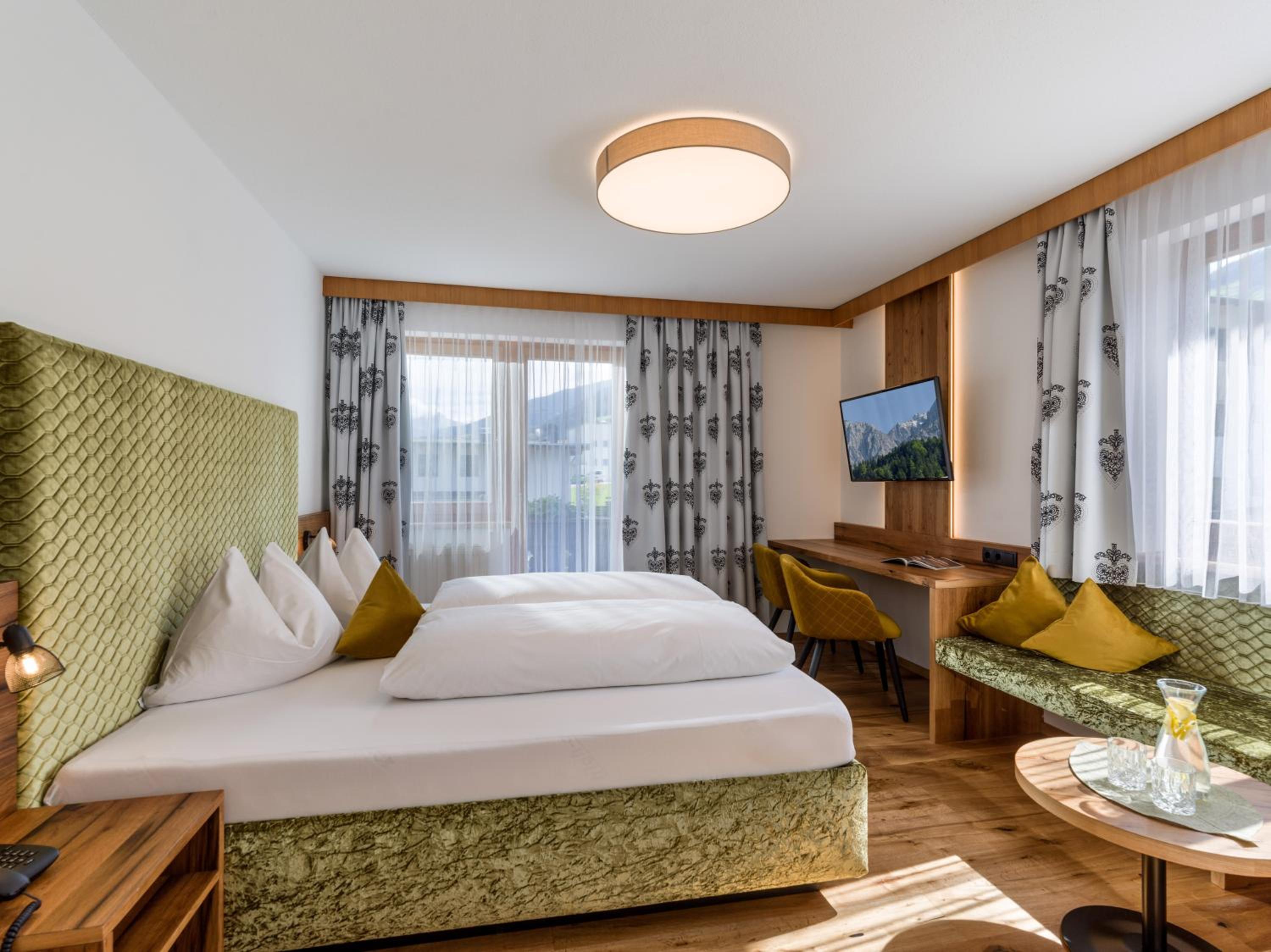 Deluxe Double Room with Balcony - Photo 1