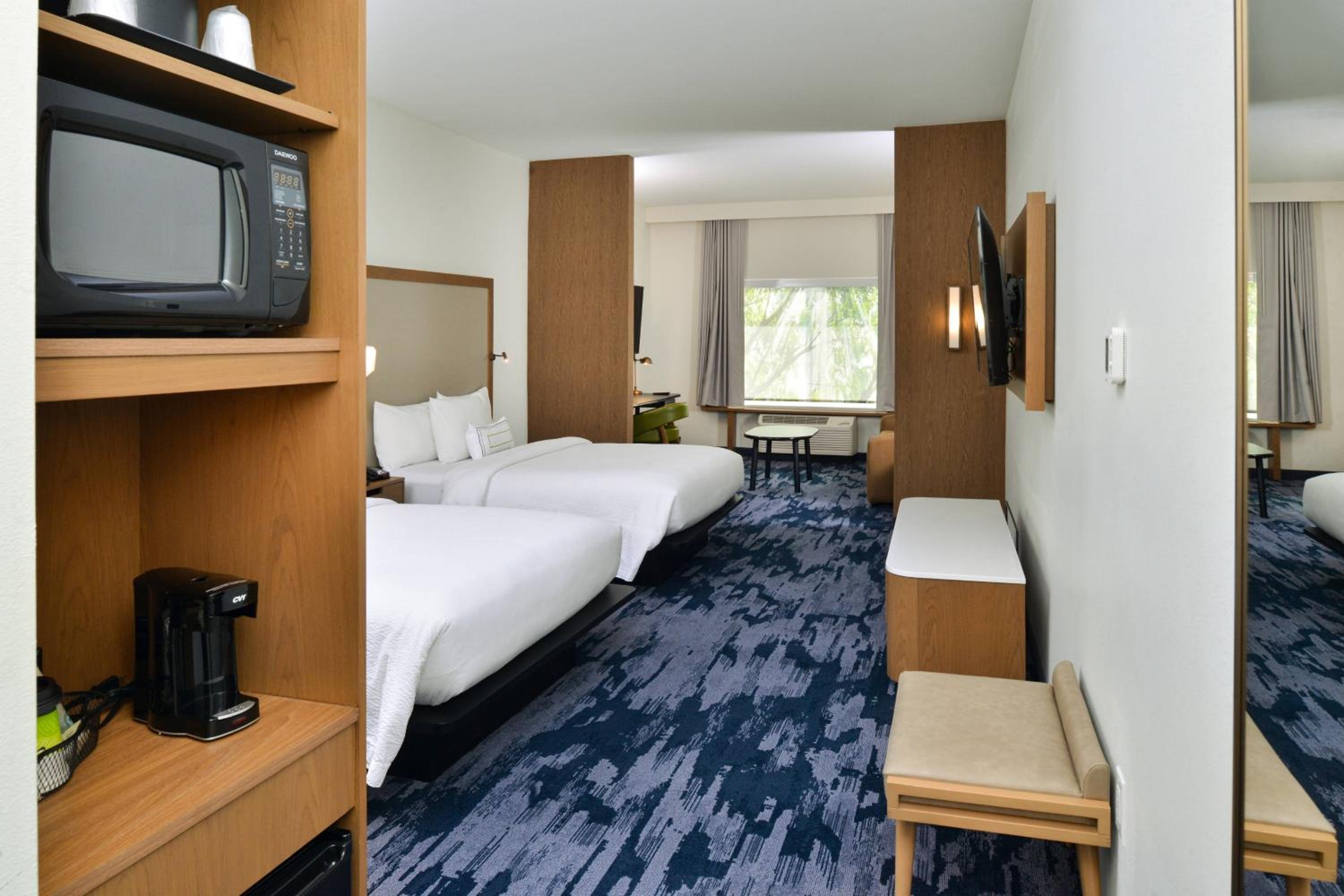 Queen Suite with Two Queen Beds and Sofa Bed - Hearing Accessible - Photo 1