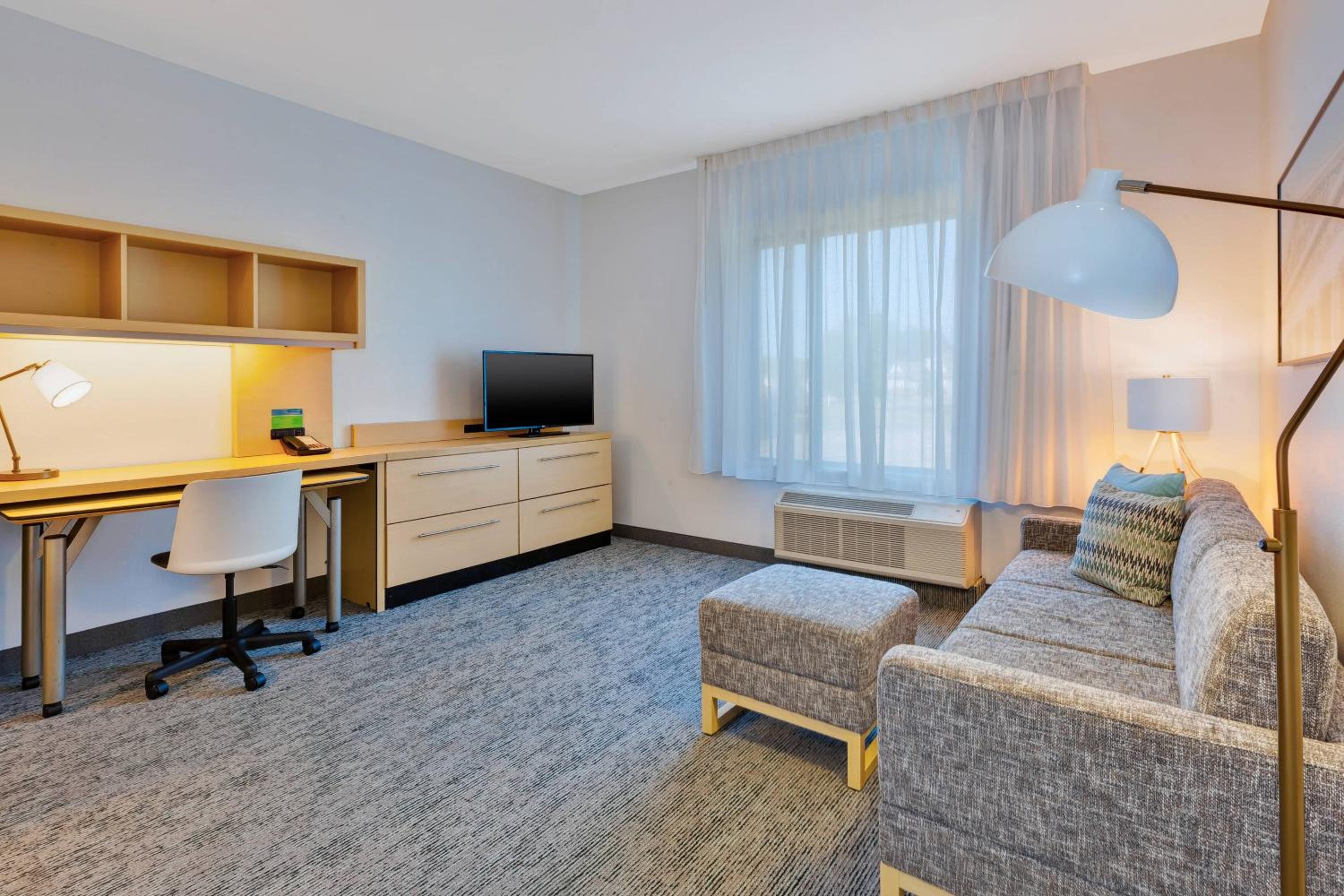 One-Bedroom Queen Suite with Sofa Bed - Photo 1