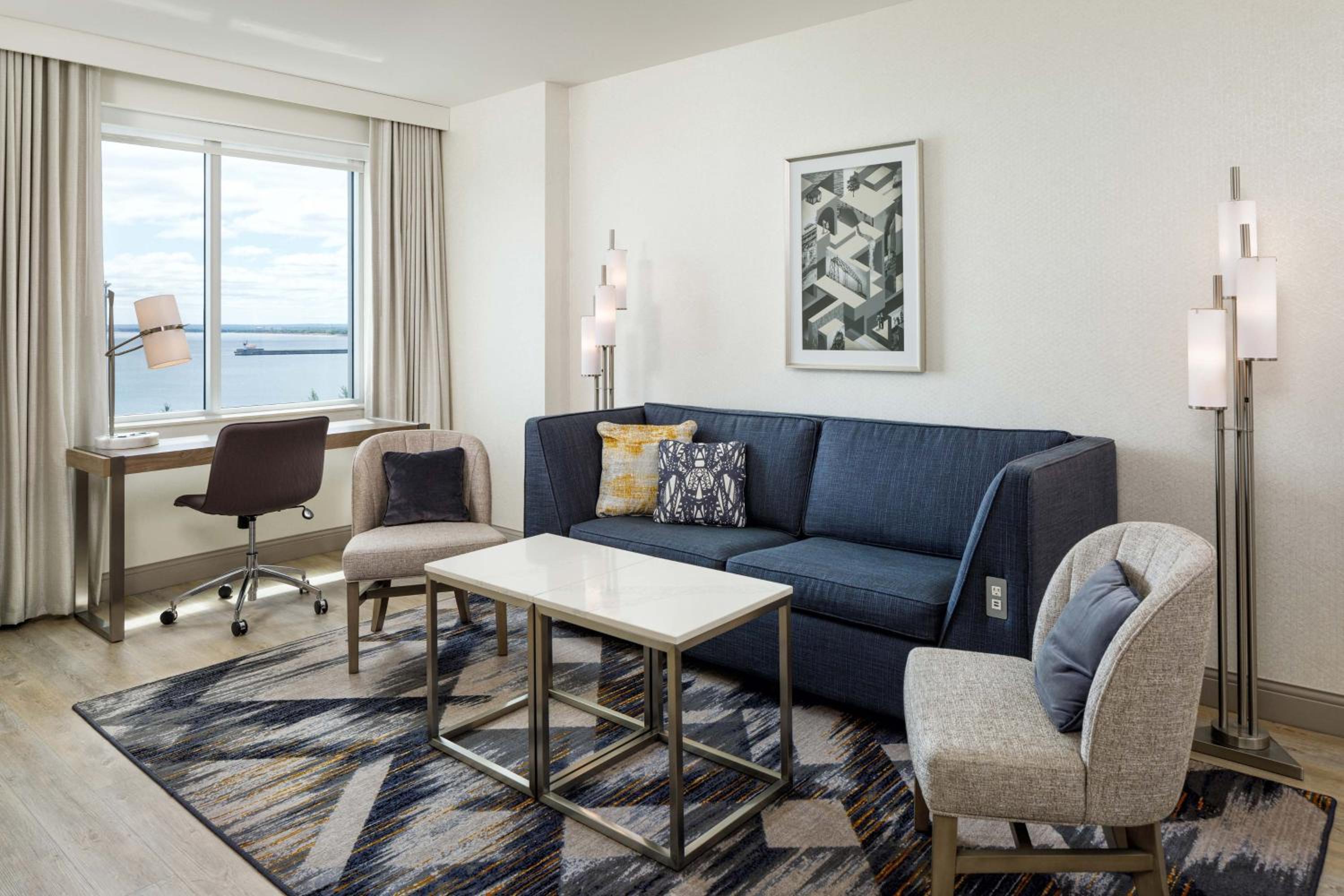Club level, Suite, 1 King, Sofa bed, Lake view, High floor