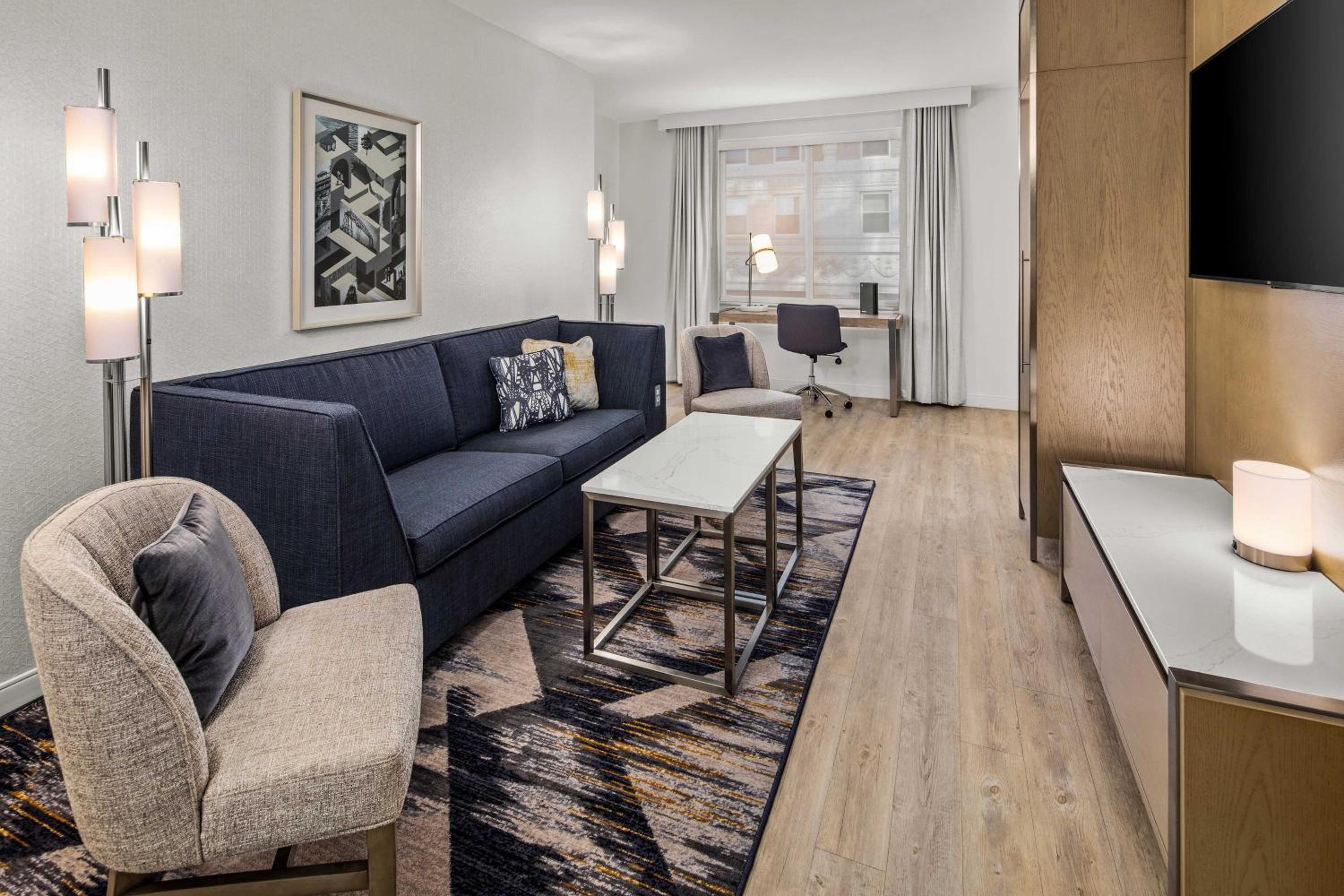 Suite, 1 King, Sofa bed, Lake view, Corner room - Photo 1