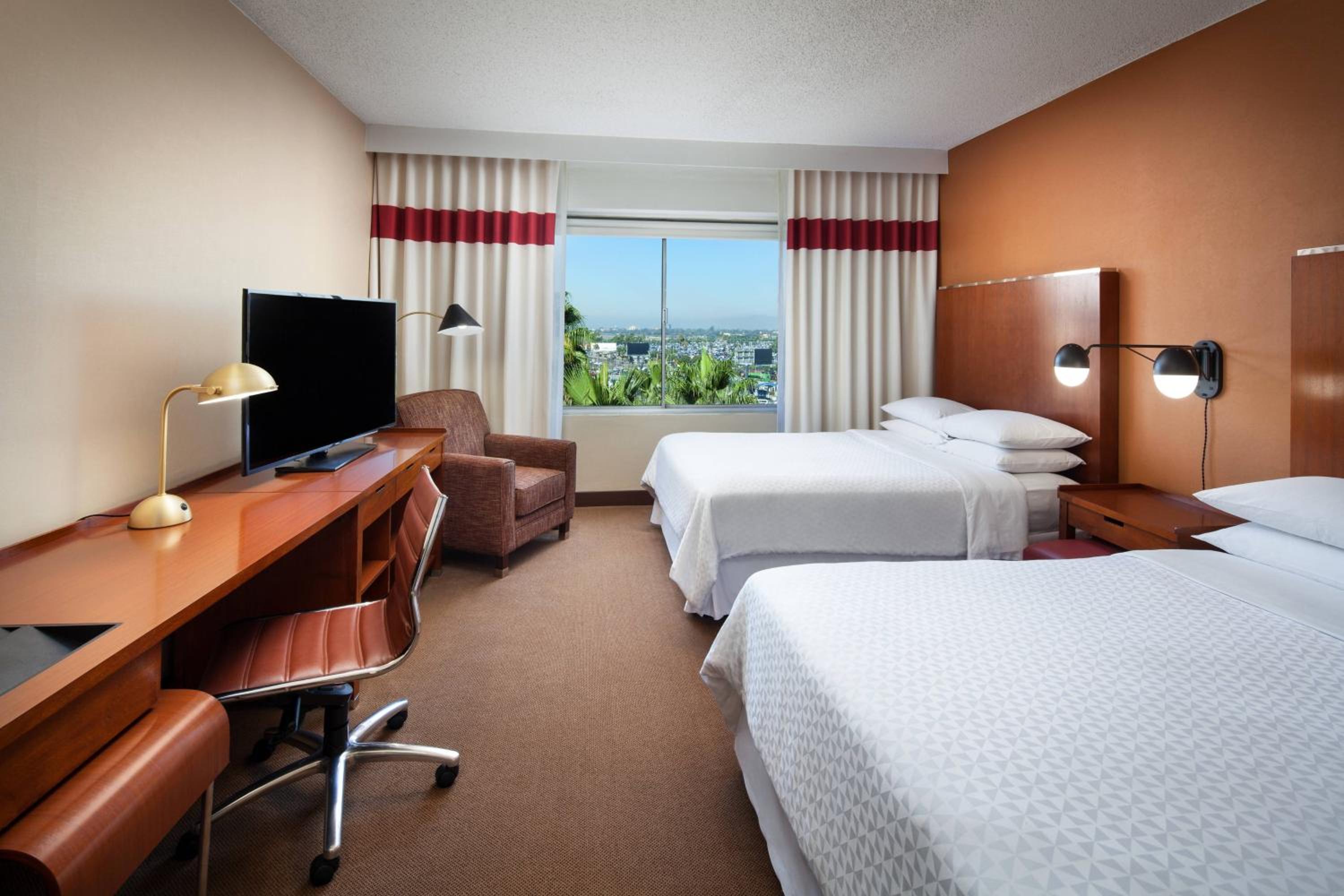 Larger Queen Room With Two Queen Beds