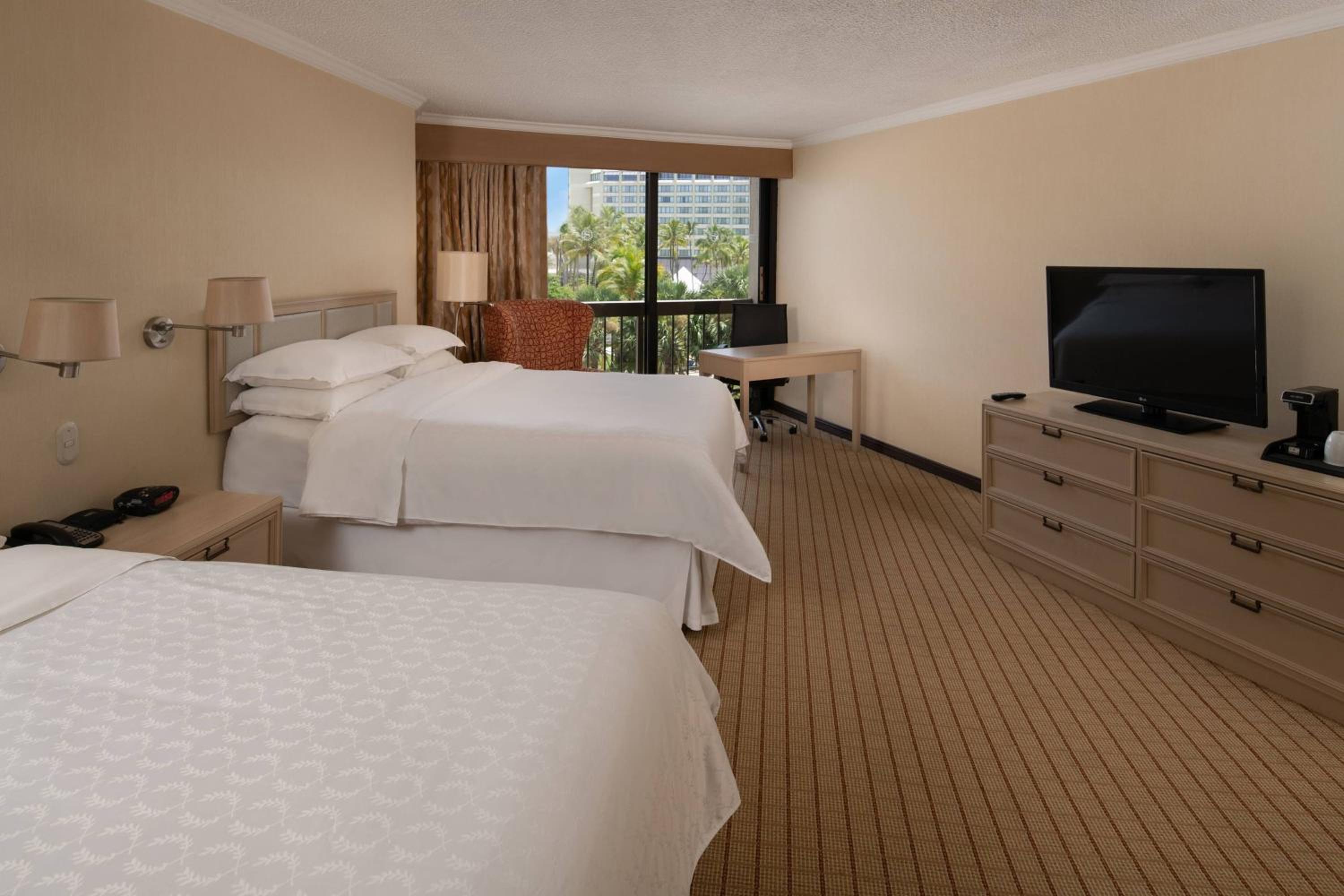 Larger Guest room, 2 Queen, Partial ocean view - Photo 2