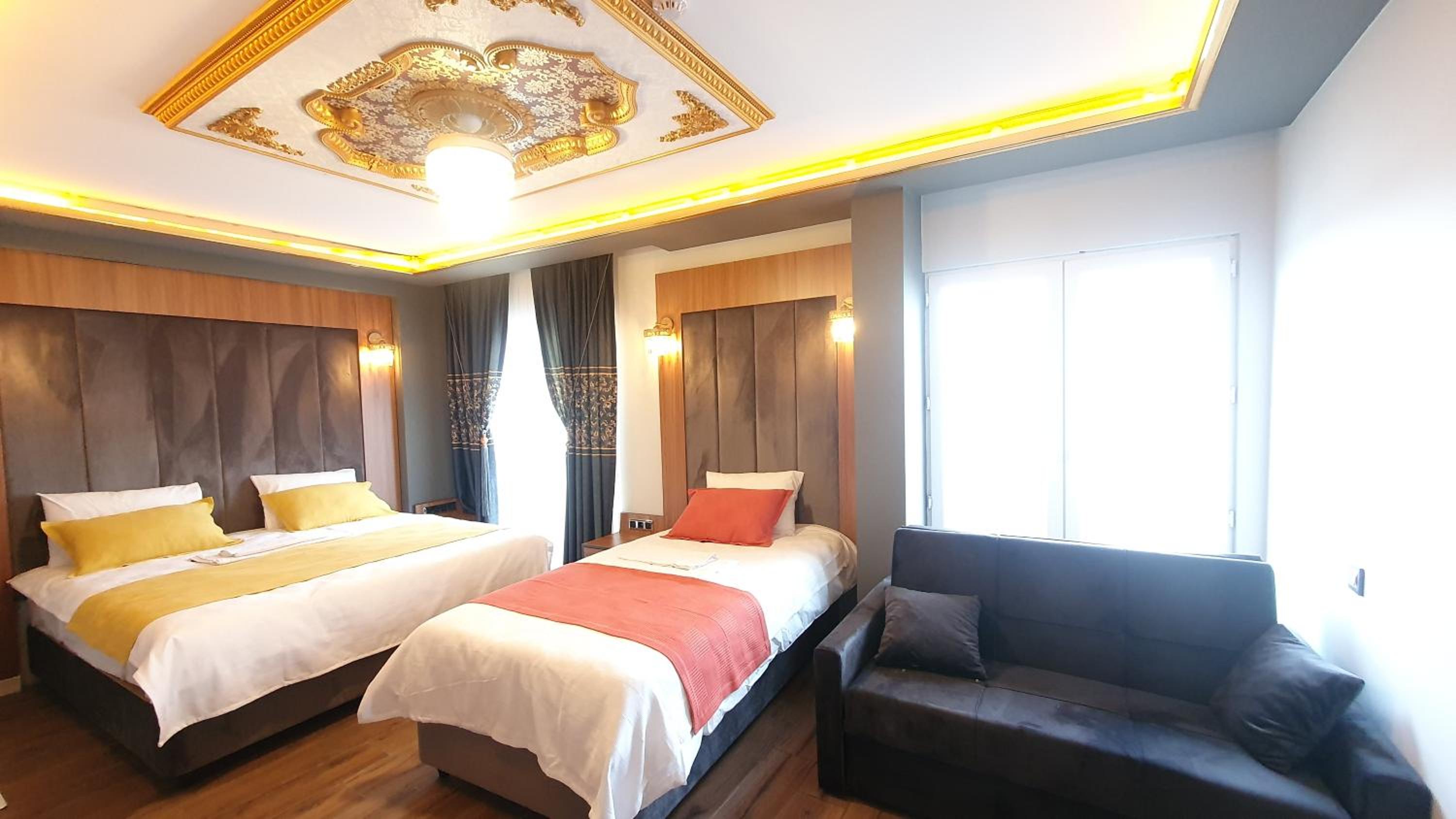 Deluxe Triple Room - Photo 10