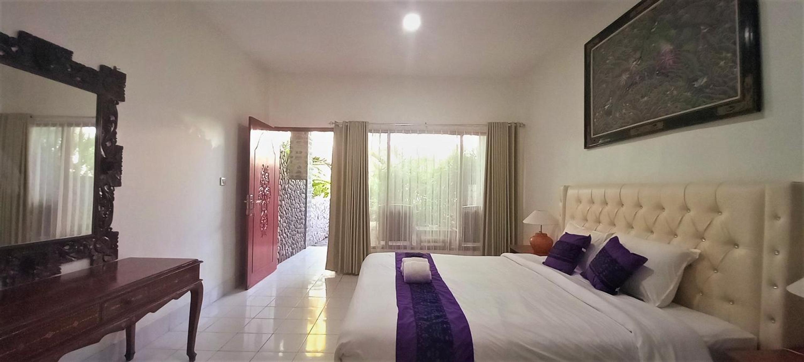 Deluxe Room - Photo 9