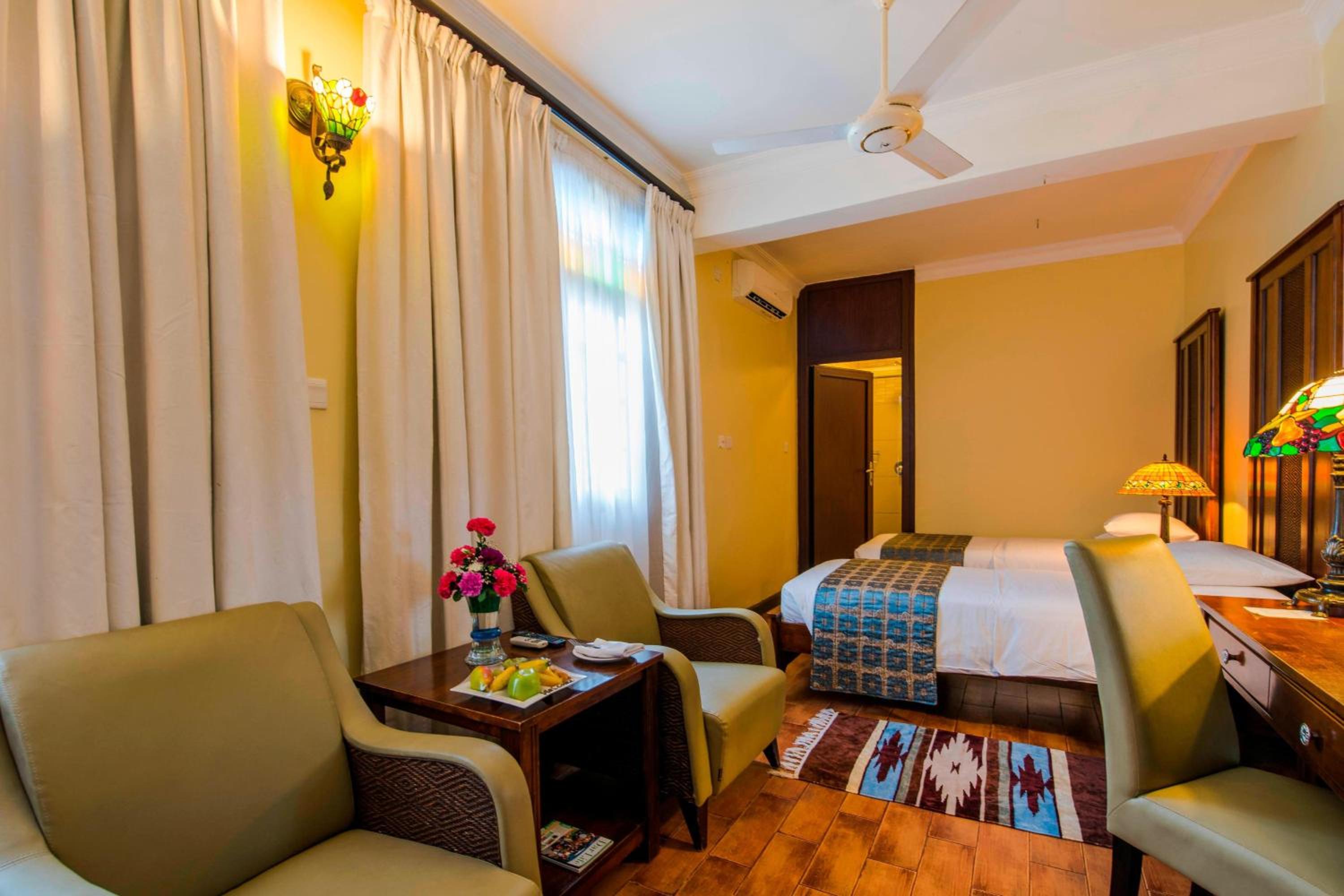 Guest Room with Twin Beds and Garden View - Photo 1