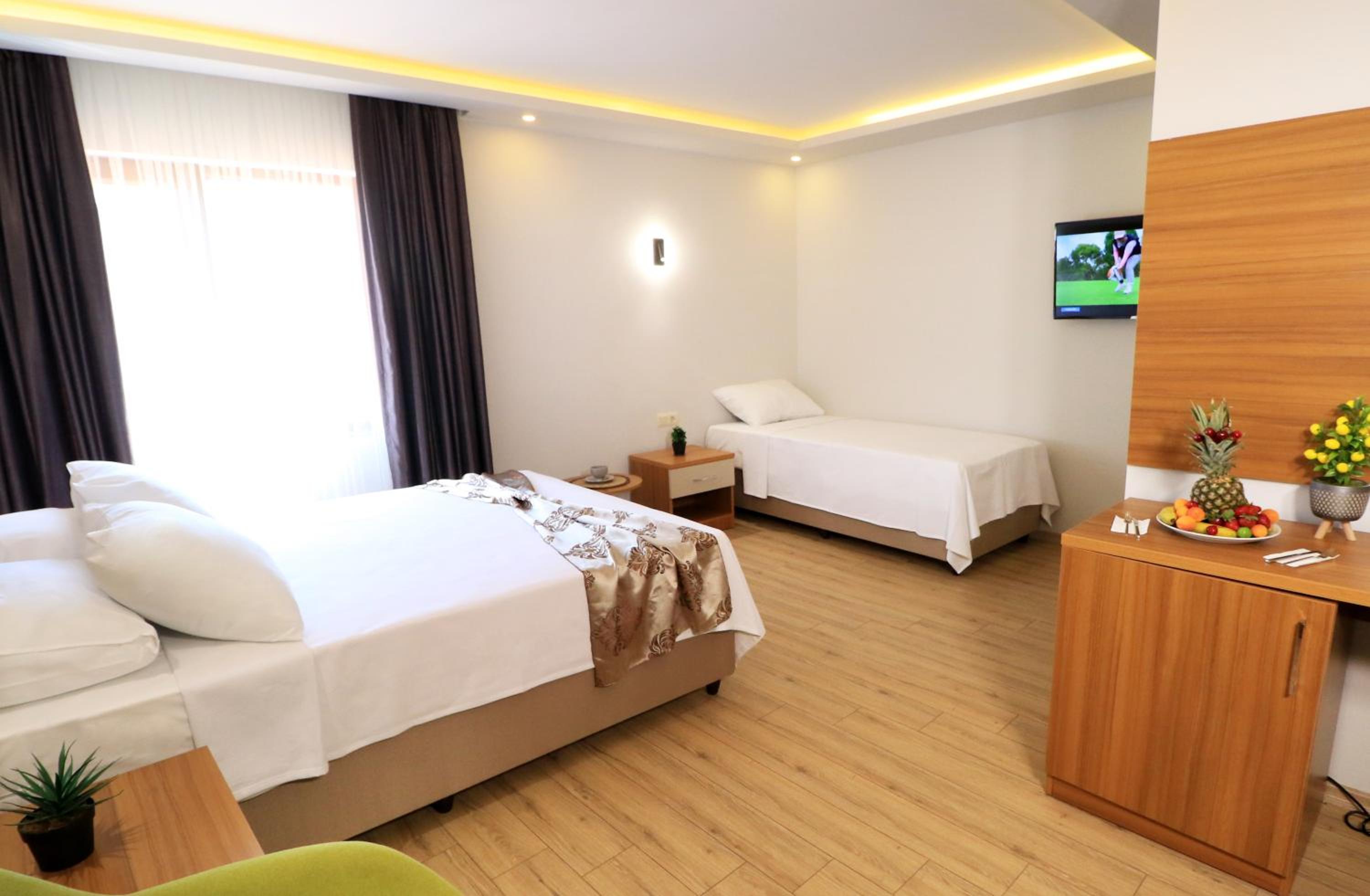 Standard Triple Room - Photo 8