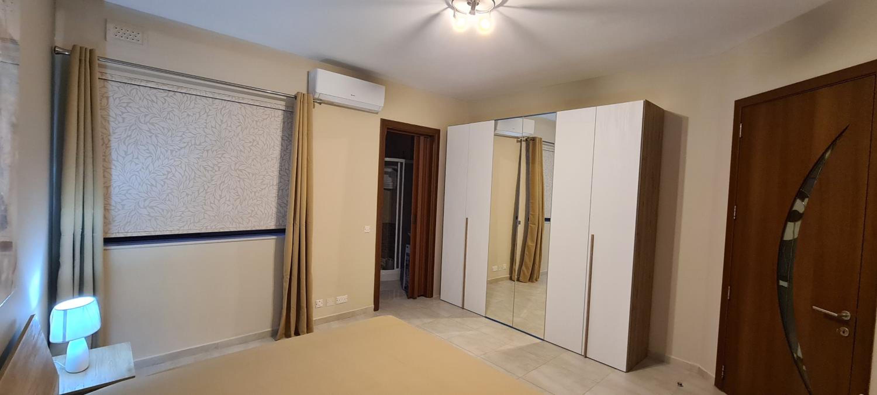 Three-Bedroom Apartment photo 1
