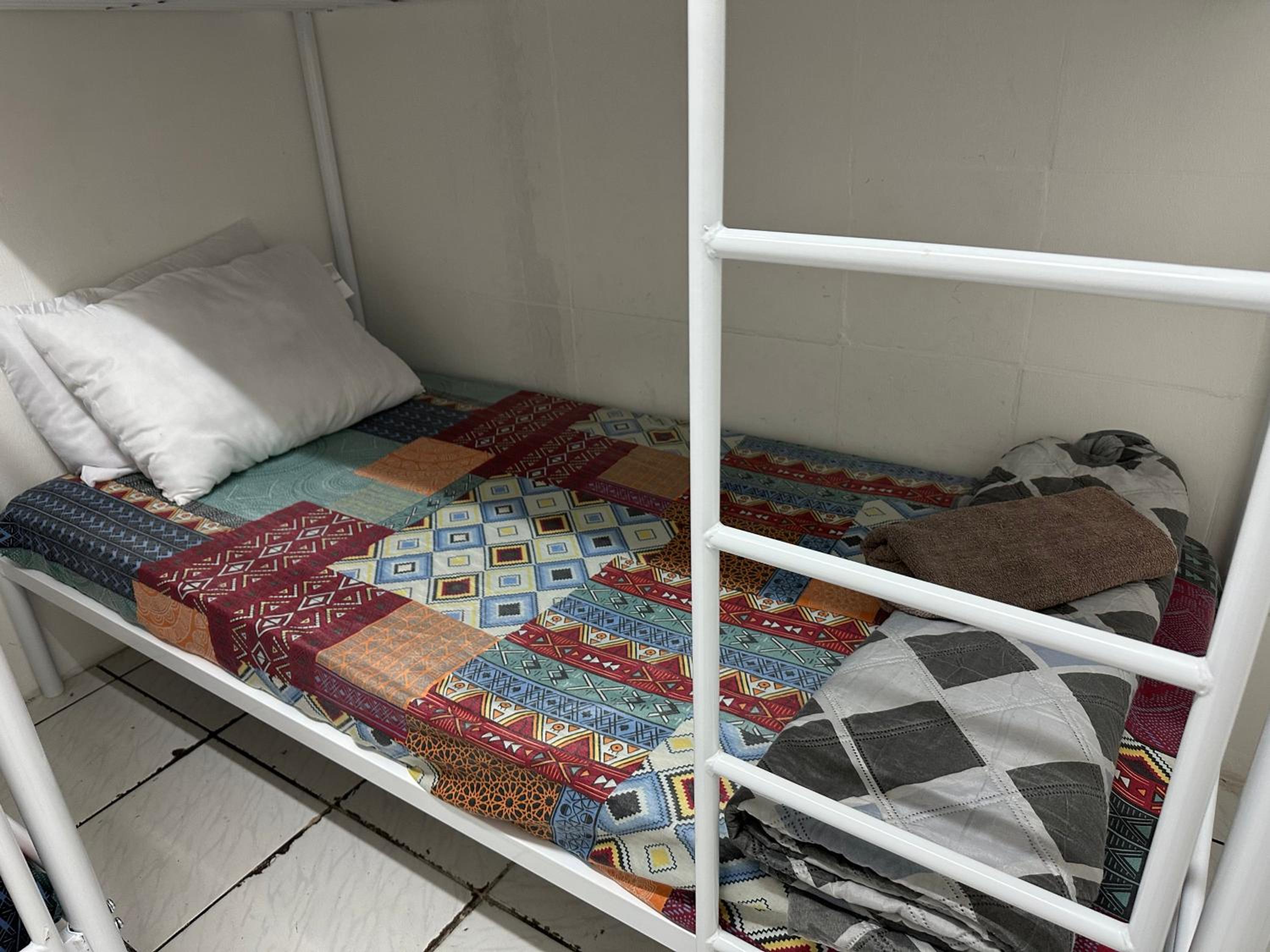 Single Bed In Female Dormitory Room photo 1
