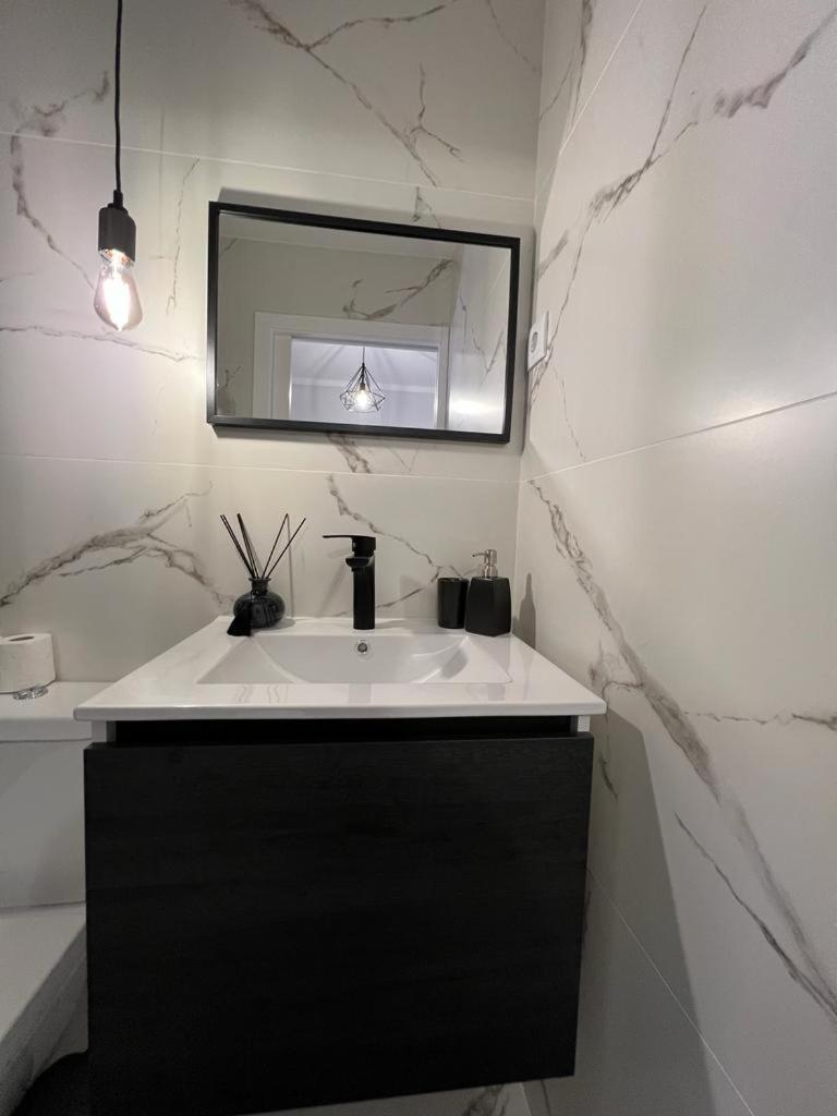 Three-Bedroom House - Photo 18