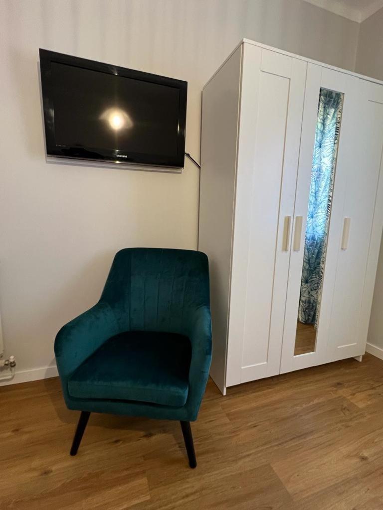 Three-Bedroom House - Photo 23
