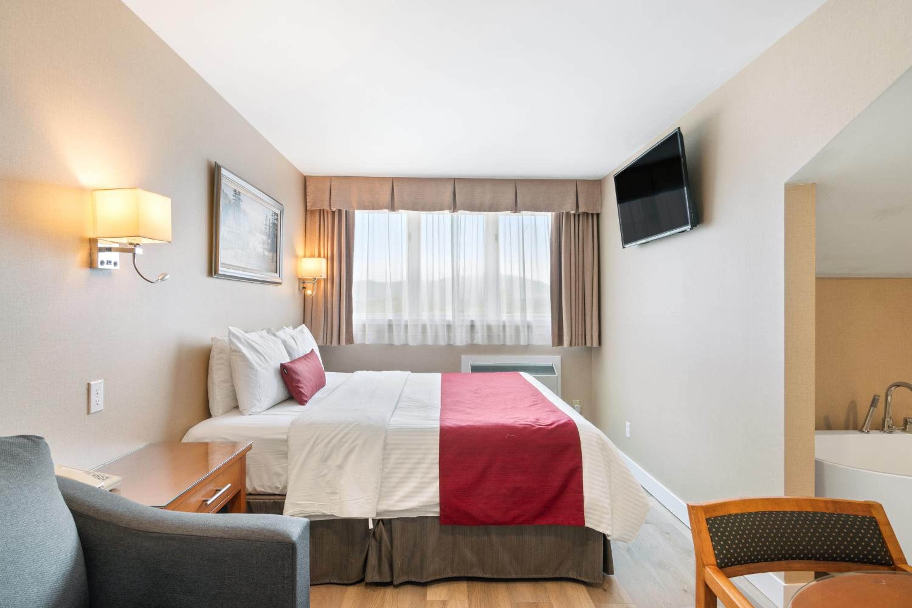 King Room - King Bed and Sofa Bed with Free Standing Bath