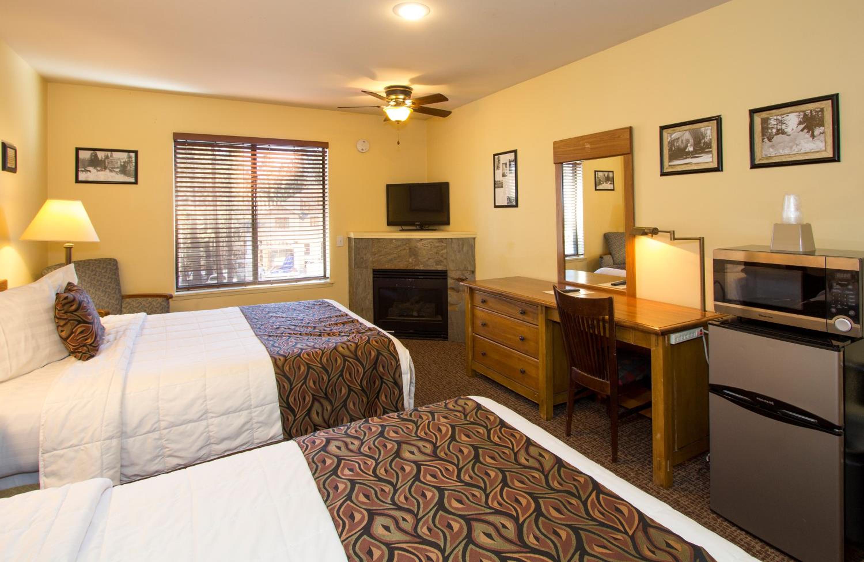 Queen room with 2 queen beds and fireplace
