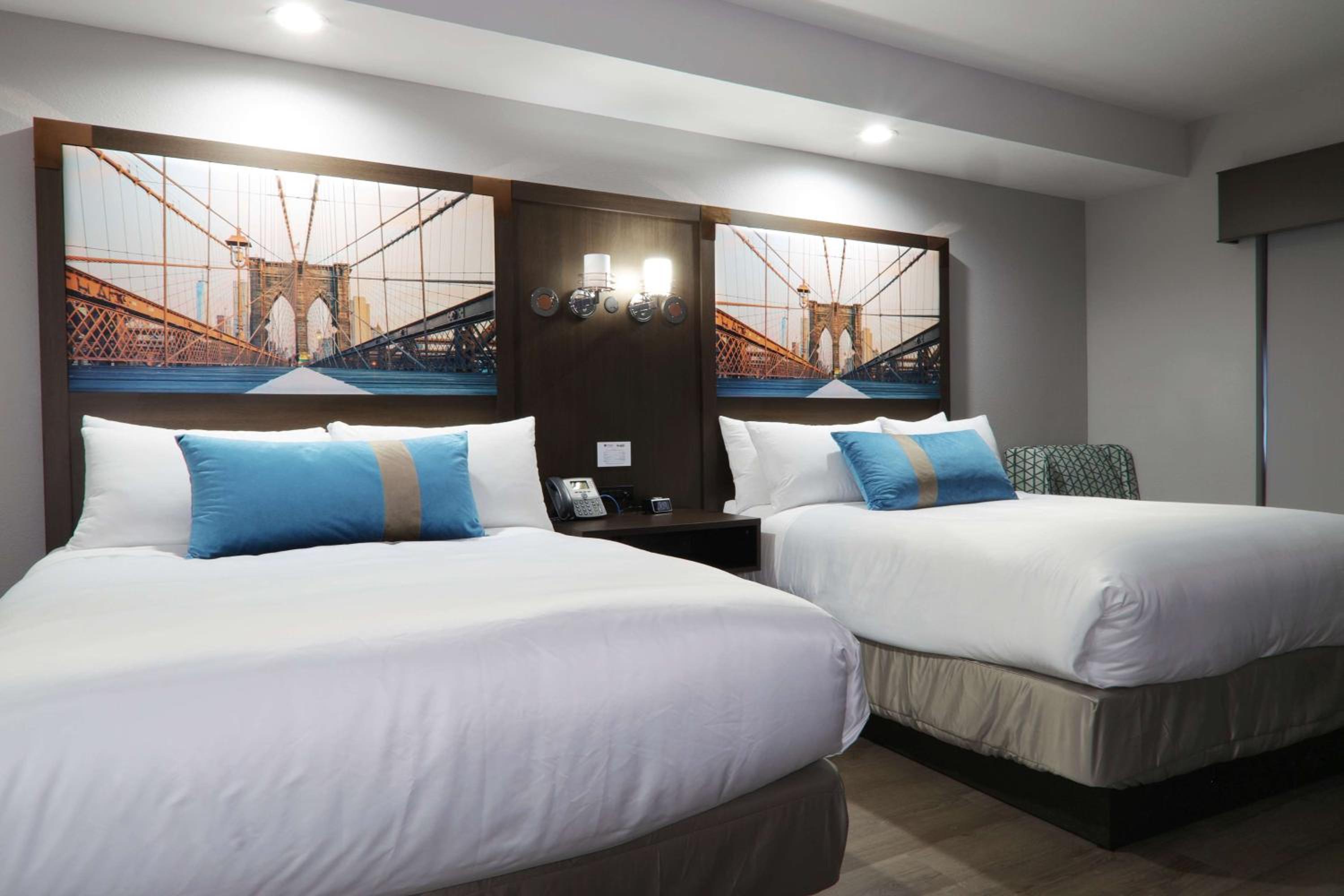Queen Suite with Two Queen Beds and Kitchenette - Non-Smoking - Photo 1