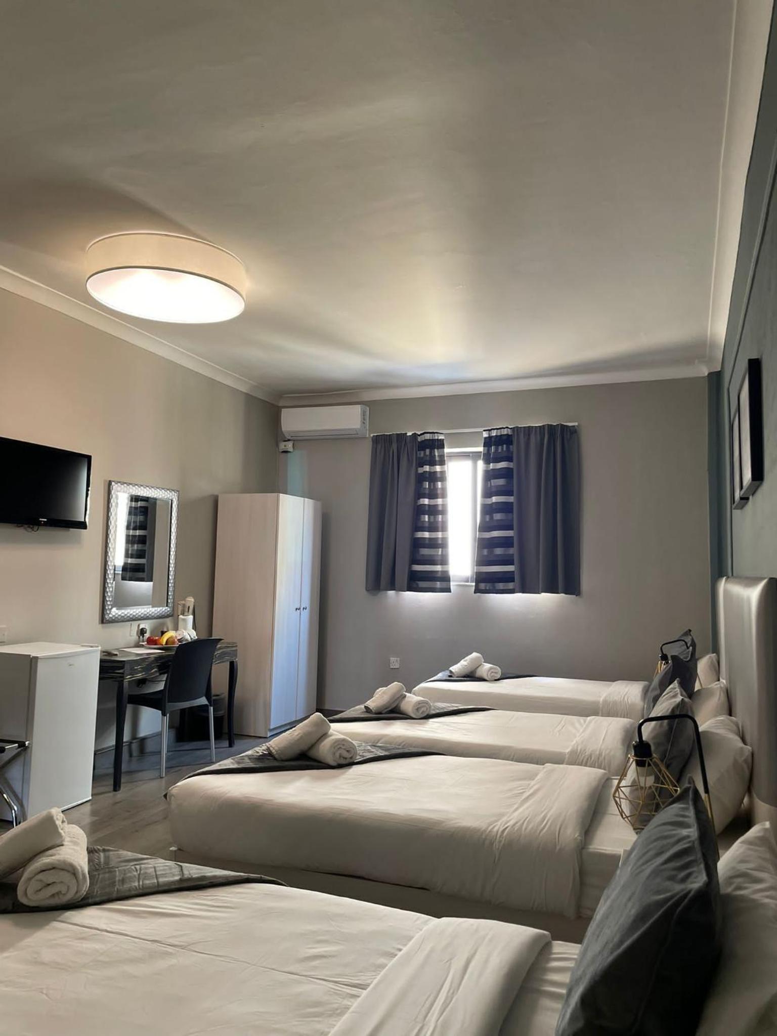 Standard Quadruple Room - Photo 1