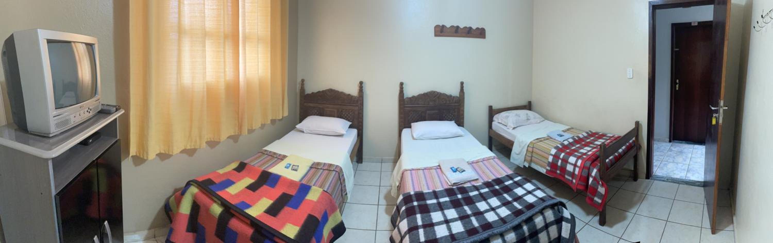 Basic Triple Room with Shared Bathroom photo 2
